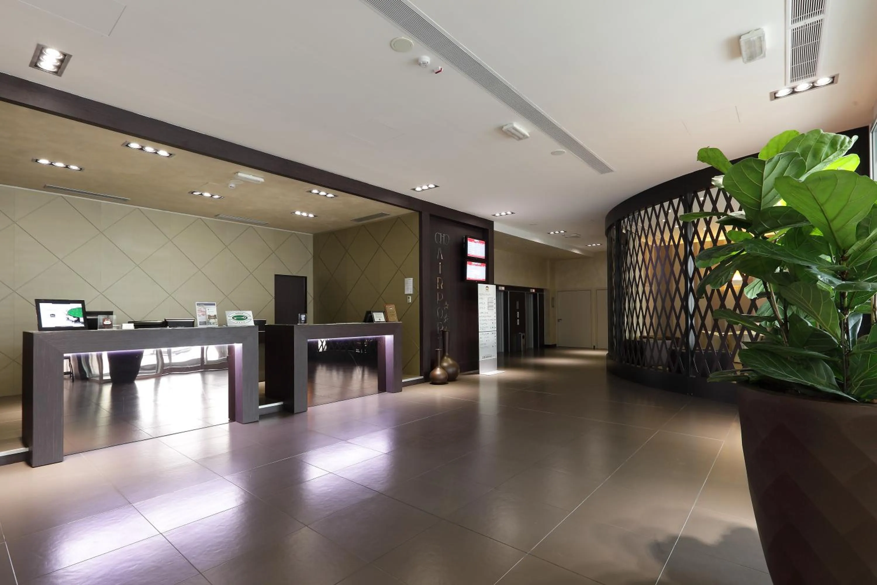 Lobby or reception in Best Western Premier CHC Airport