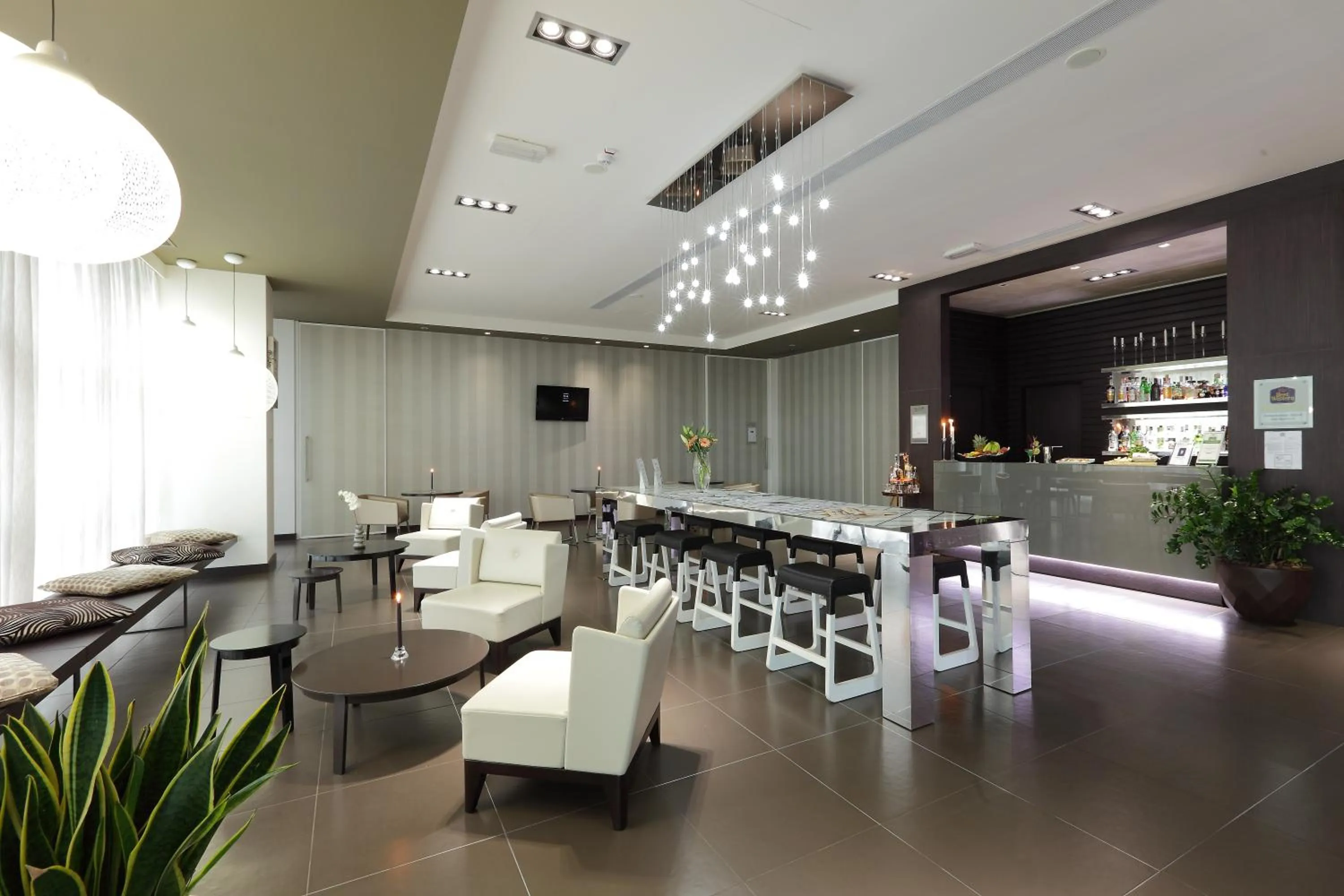 Lobby or reception in Best Western Premier CHC Airport