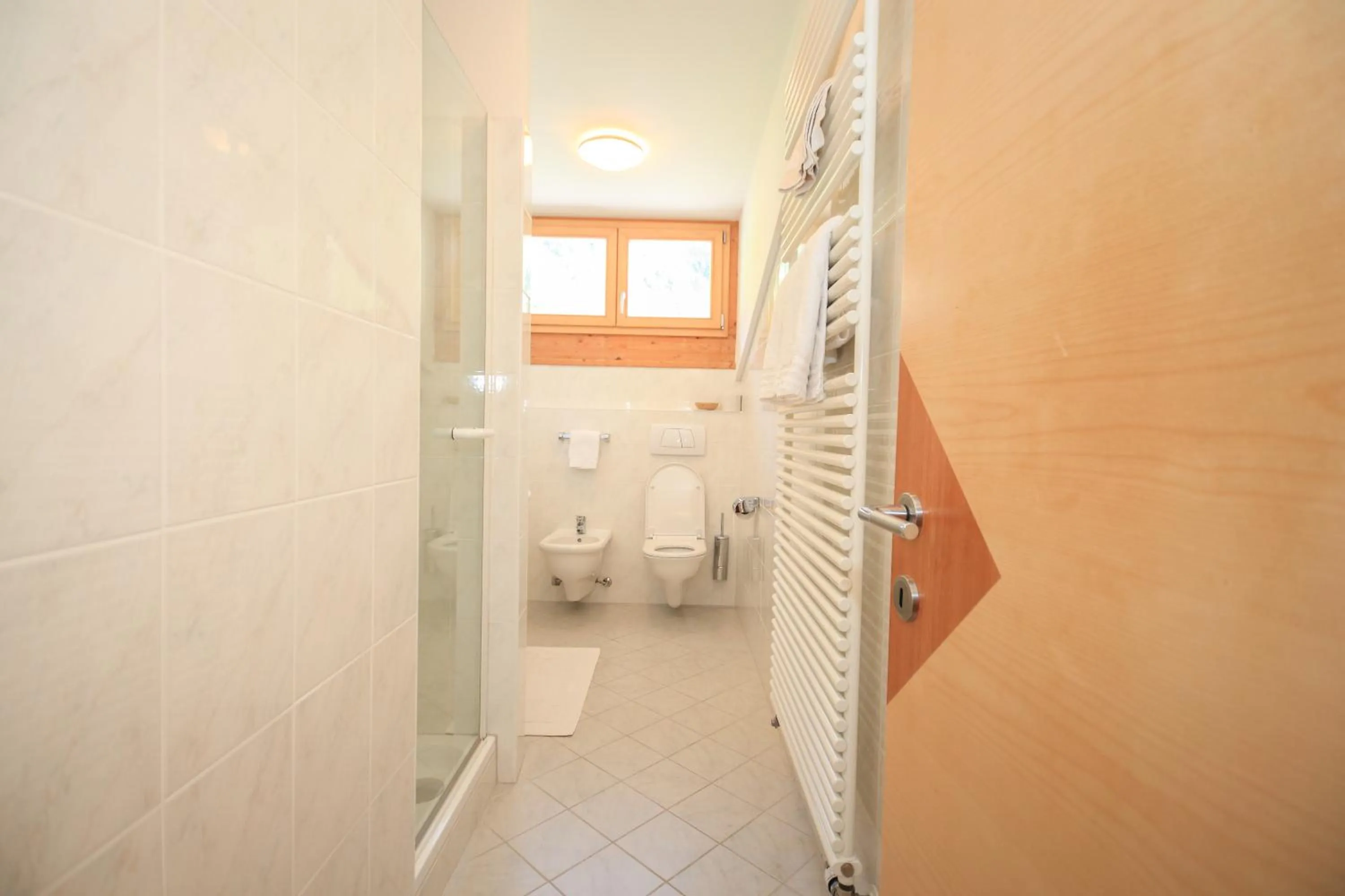 Bathroom in Garni des Alpes