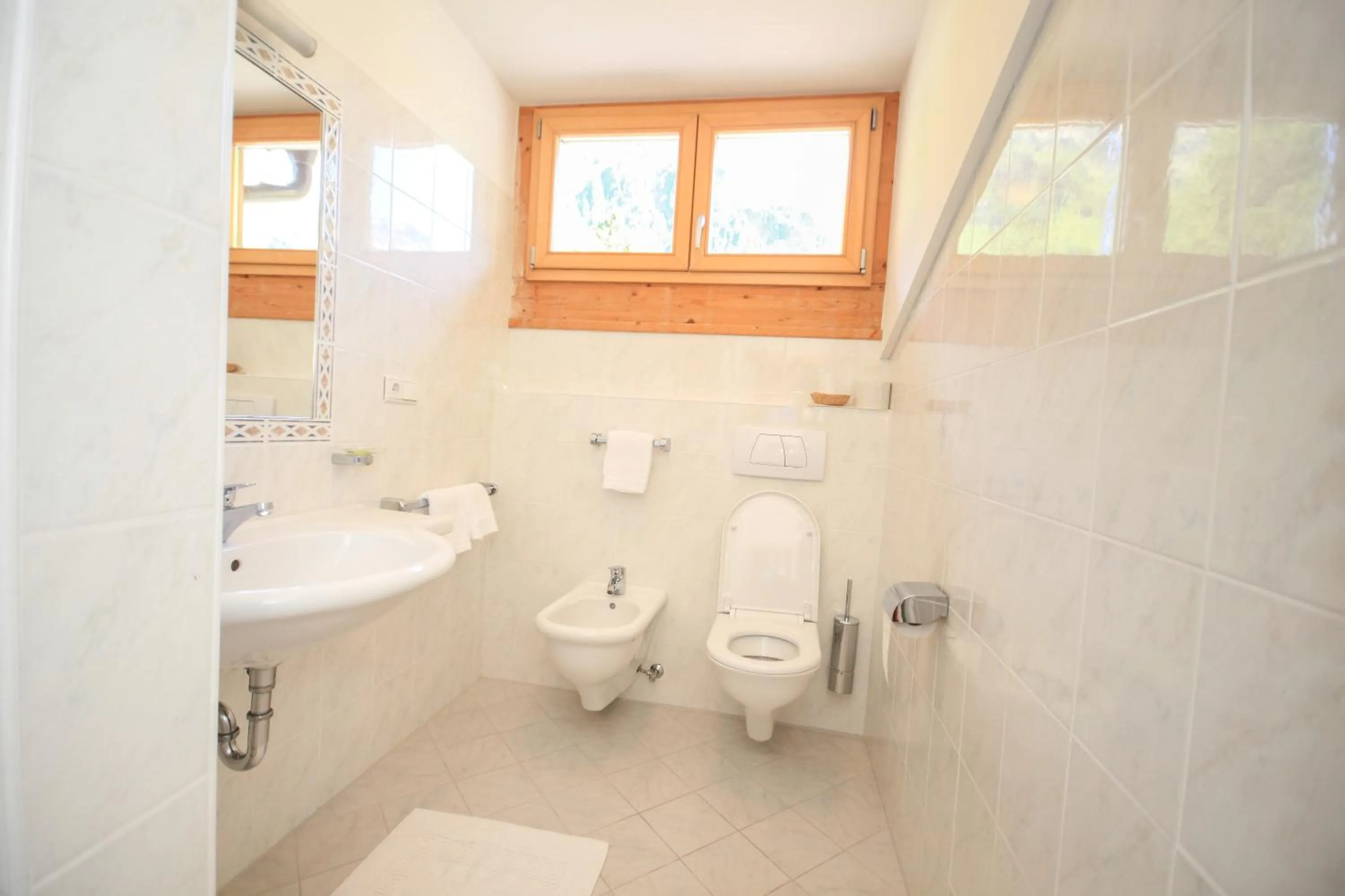 Bathroom in Garni des Alpes