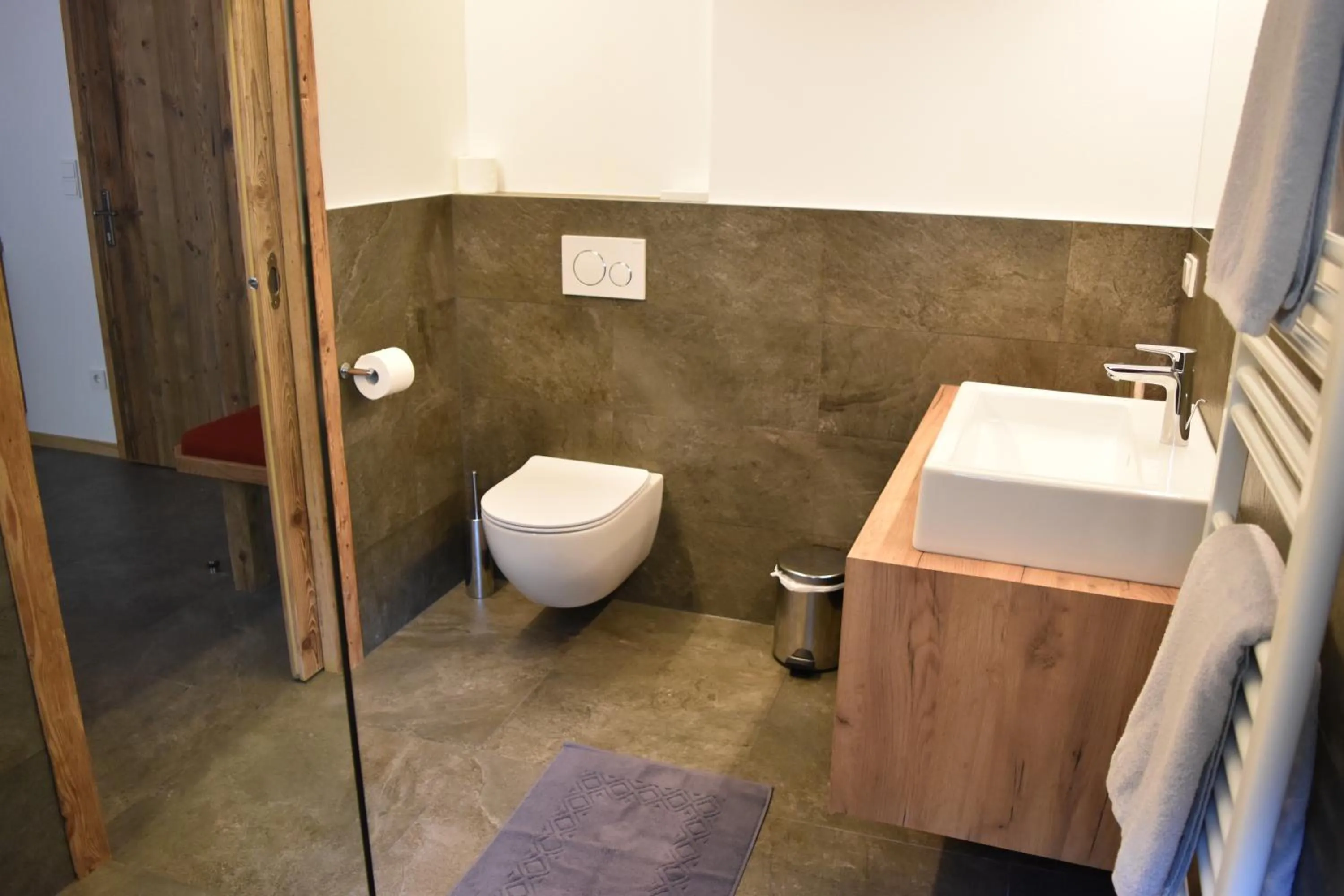 Bathroom in Garni des Alpes