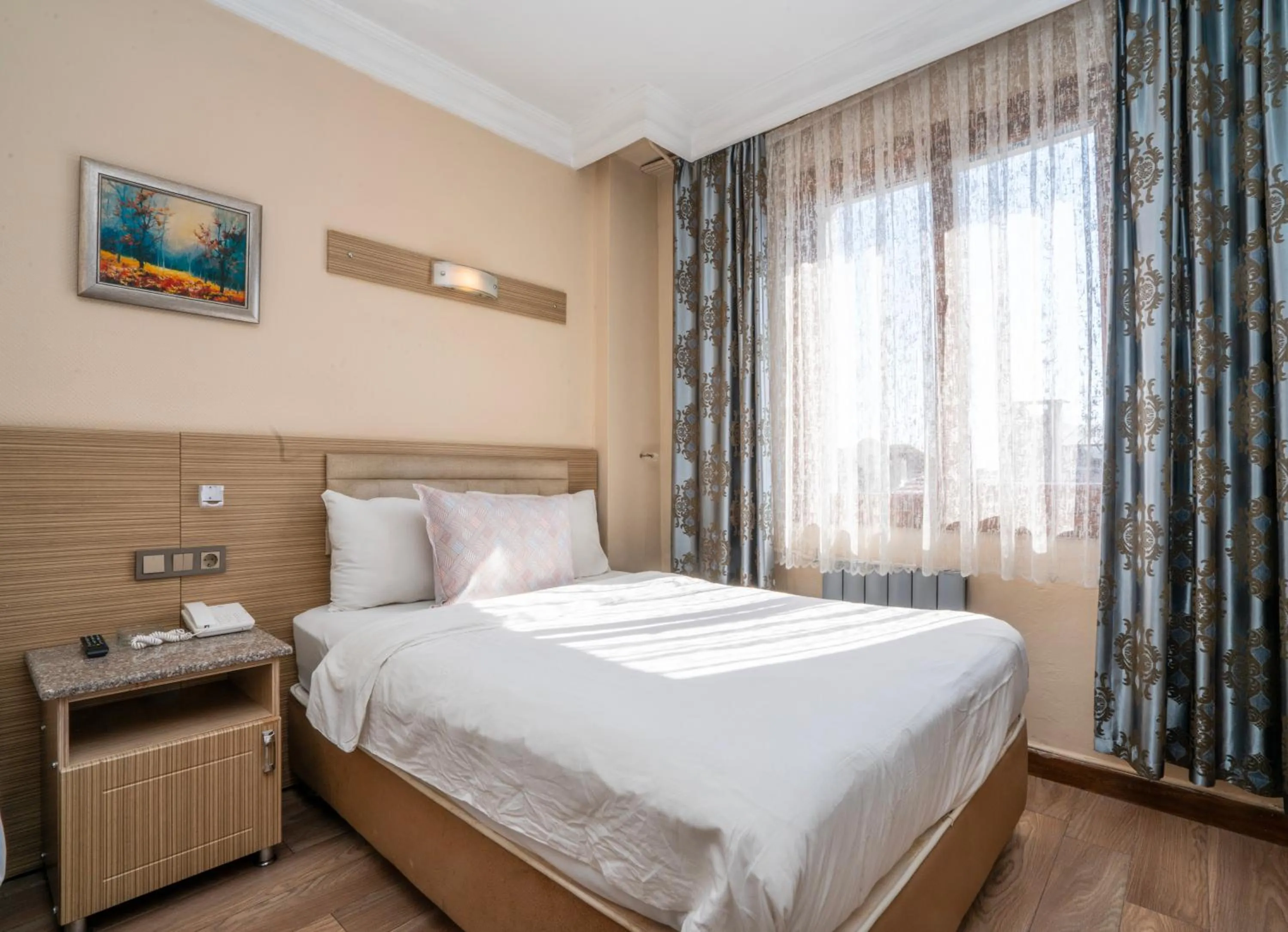 Bed in Grand Reis Hotel