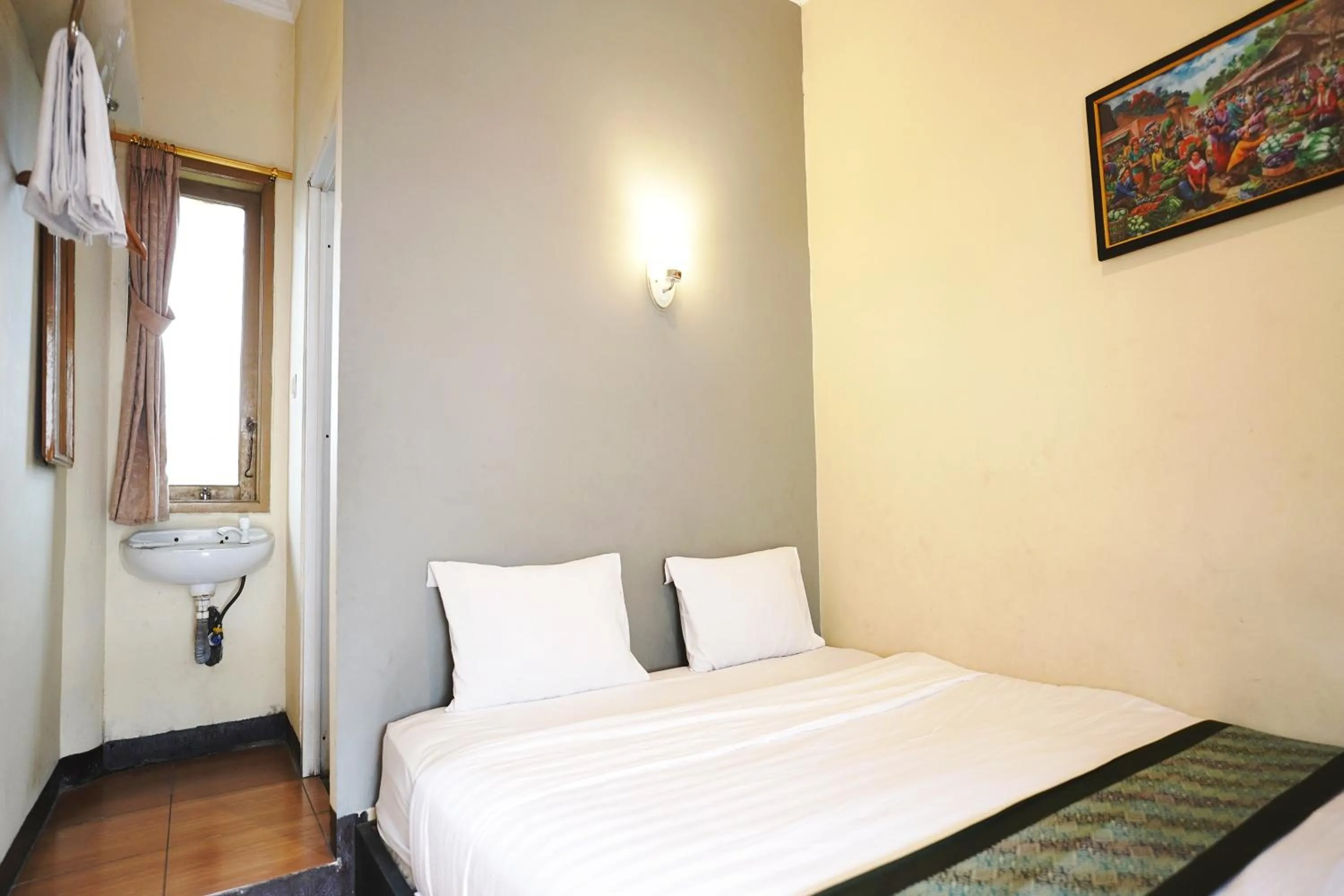 Bed in Saung Balibu Hotel