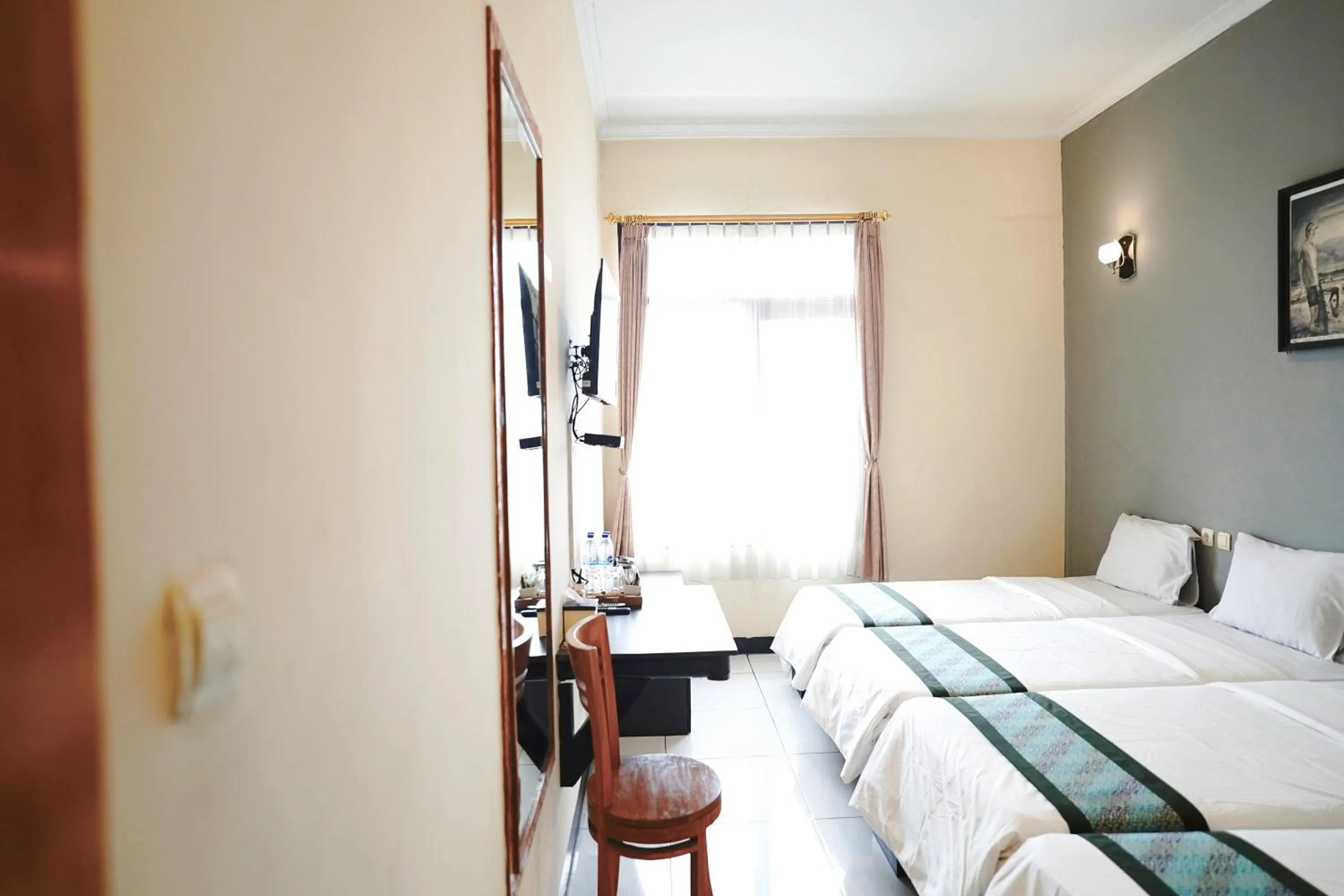 Bed in Saung Balibu Hotel