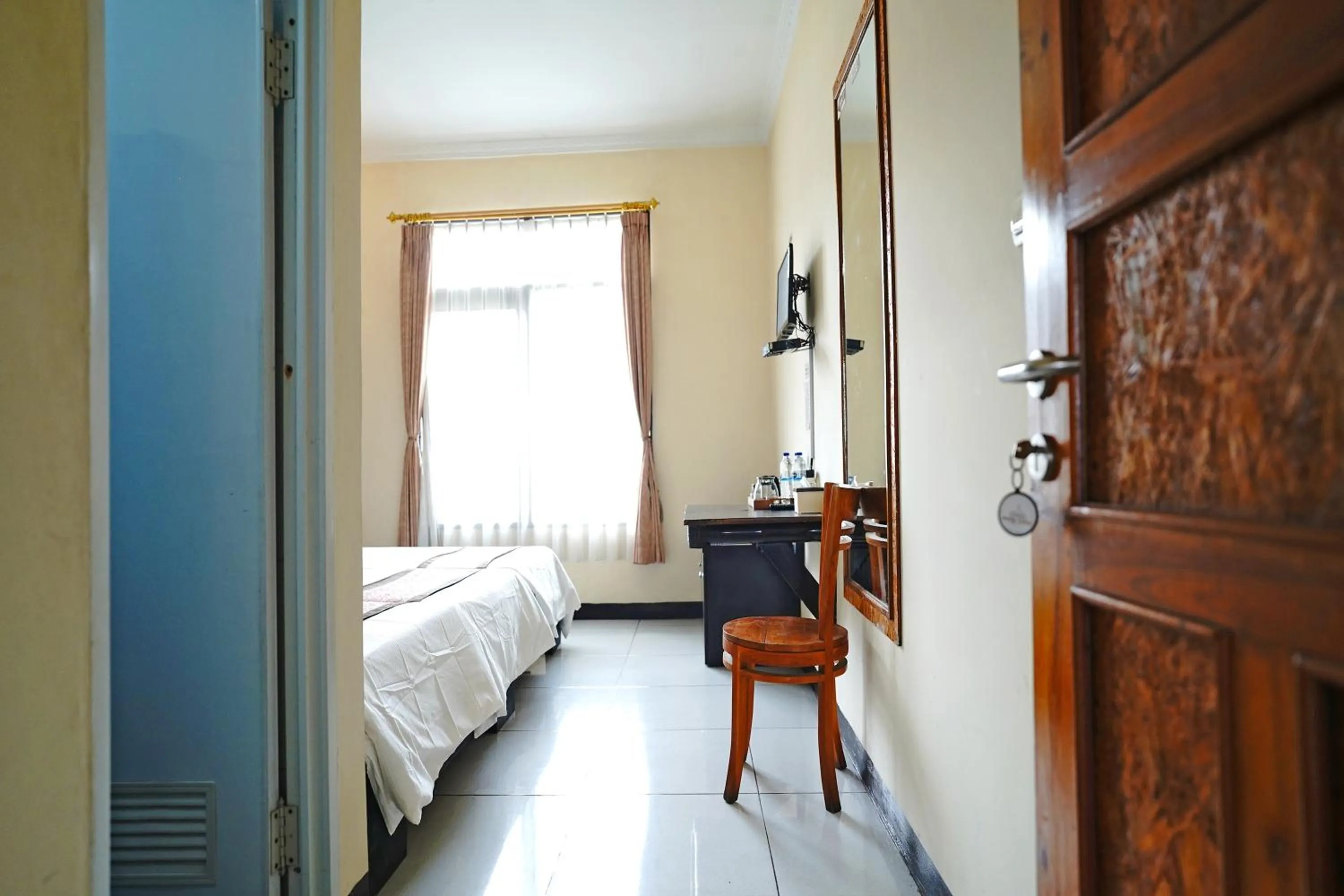 Bed in Saung Balibu Hotel