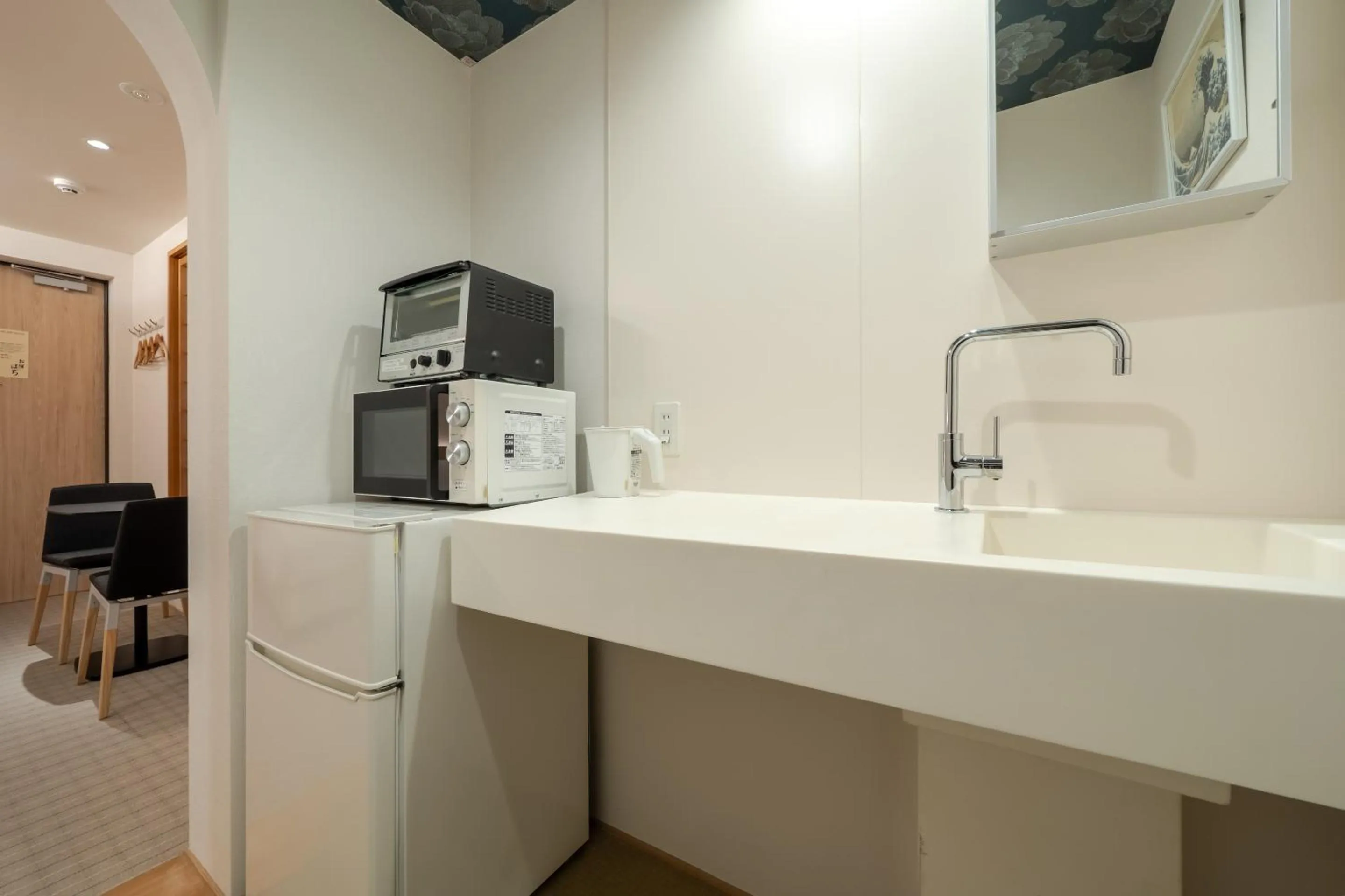 Kitchen or kitchenette in RESI STAY Hachi Inn