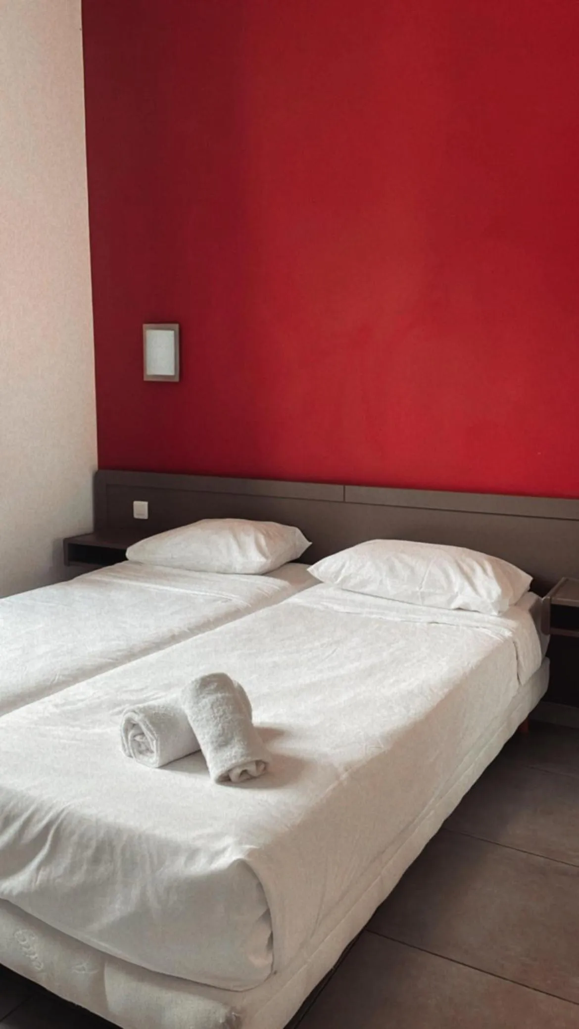 Bed in Hotel Riviera