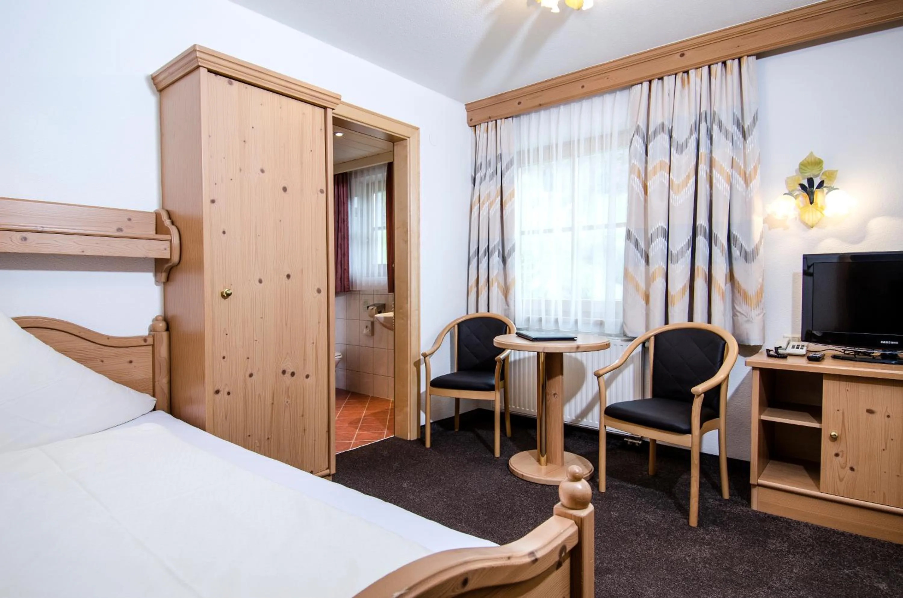 Bed in Hotel Garni Subretta