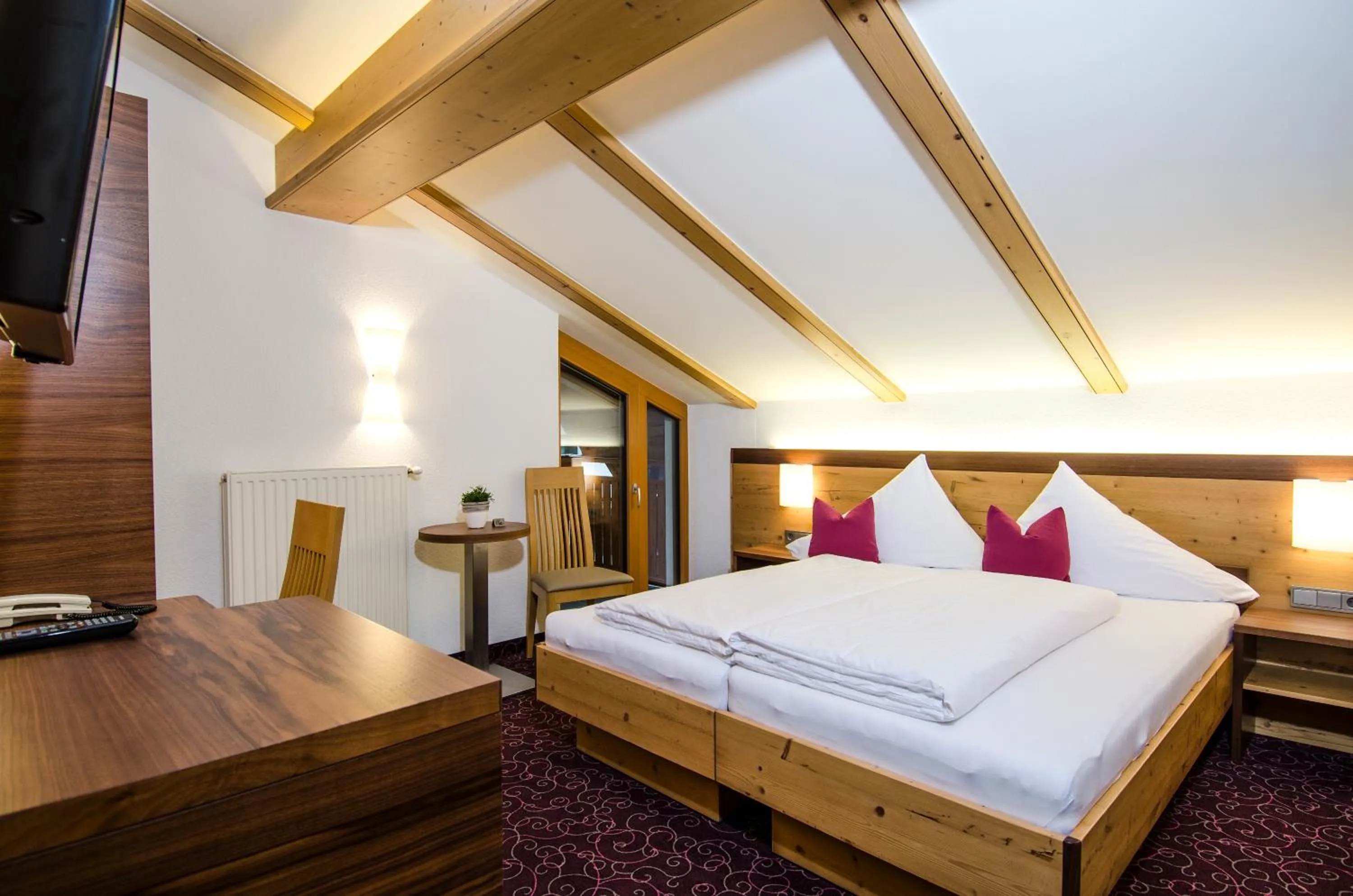 Bed in Hotel Garni Subretta