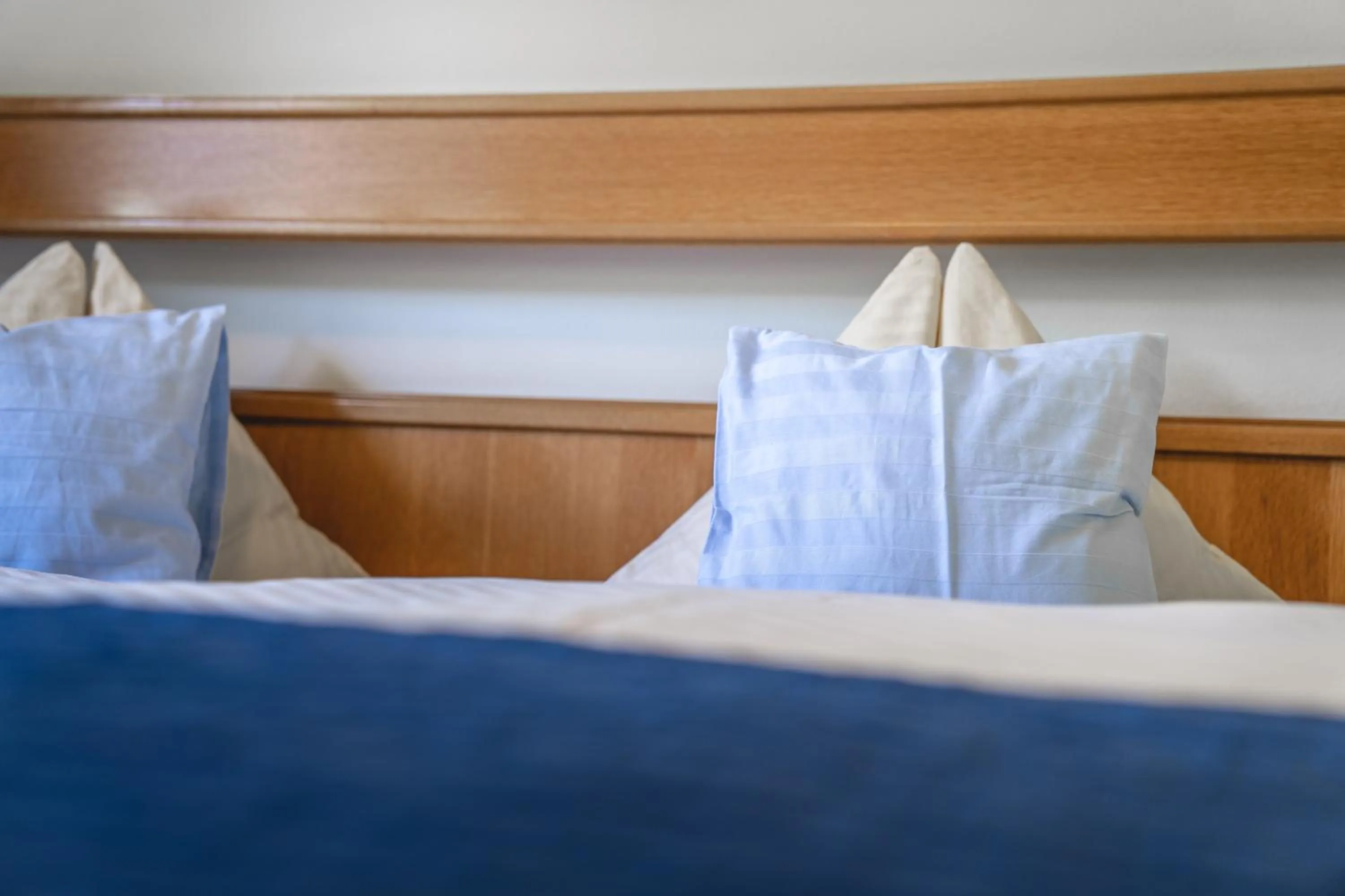 Bed in Hotel Landhaus Neumayr