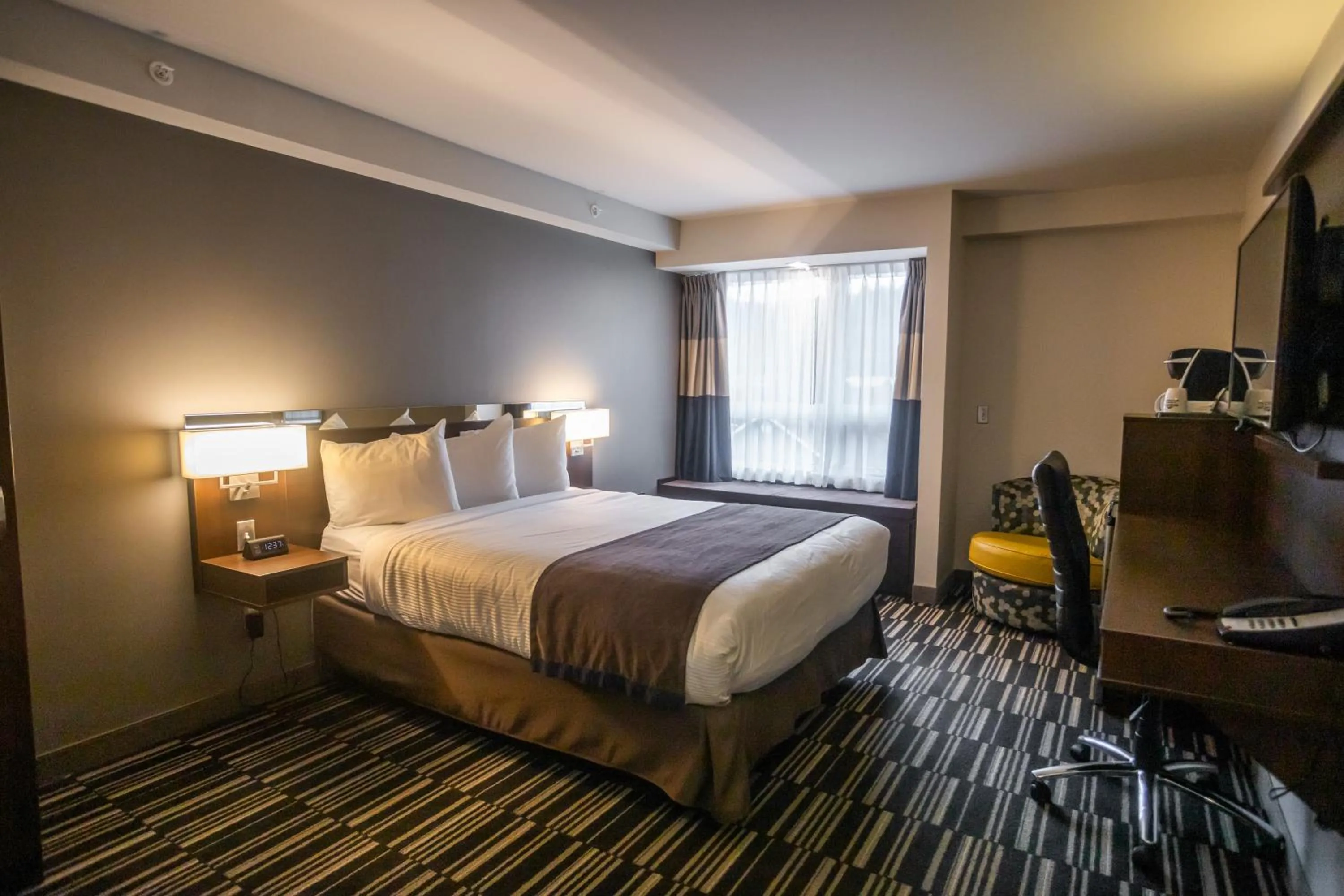 Bed in Microtel Inn & Suites by Wyndham Mont Tremblant
