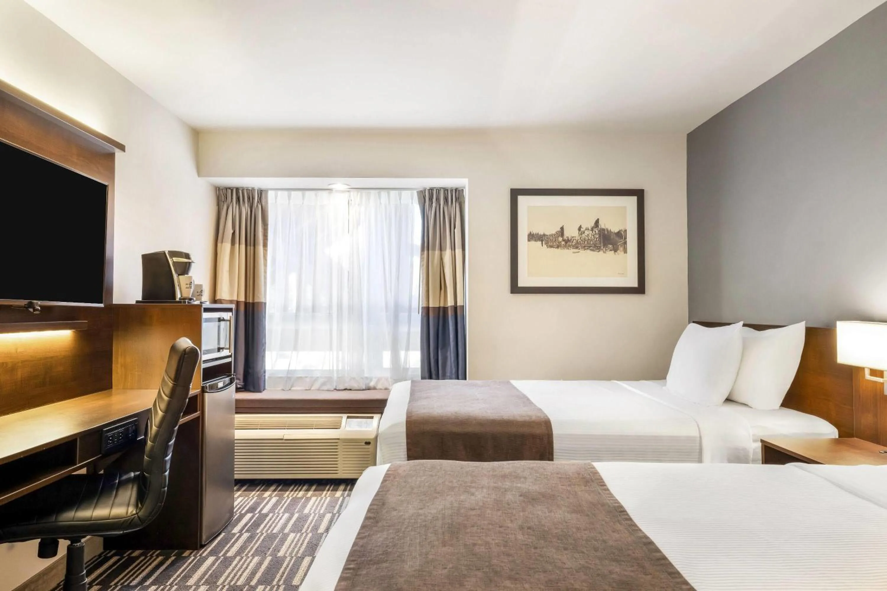 Bed in Microtel Inn & Suites by Wyndham Mont Tremblant