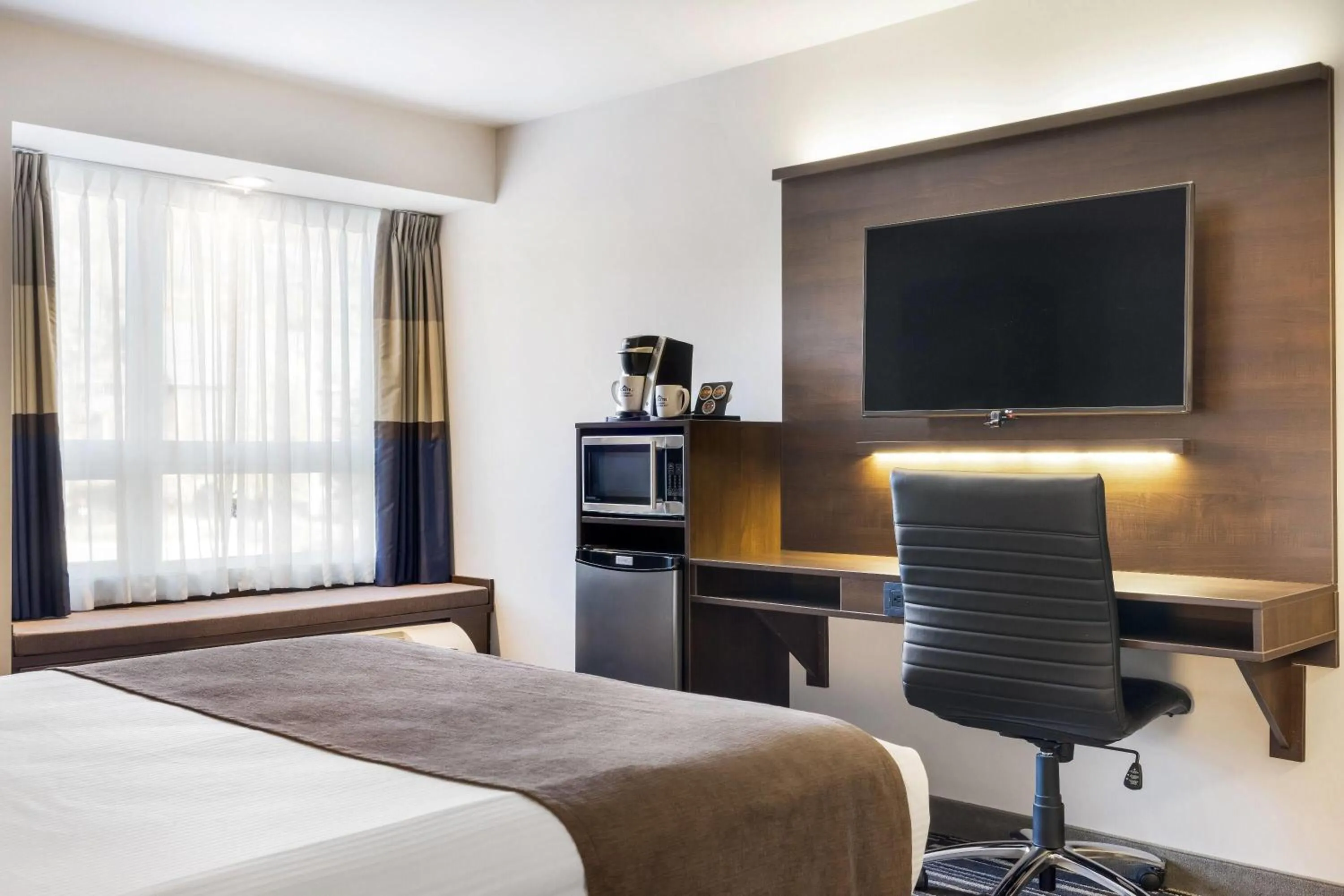 Bed in Microtel Inn & Suites by Wyndham Mont Tremblant