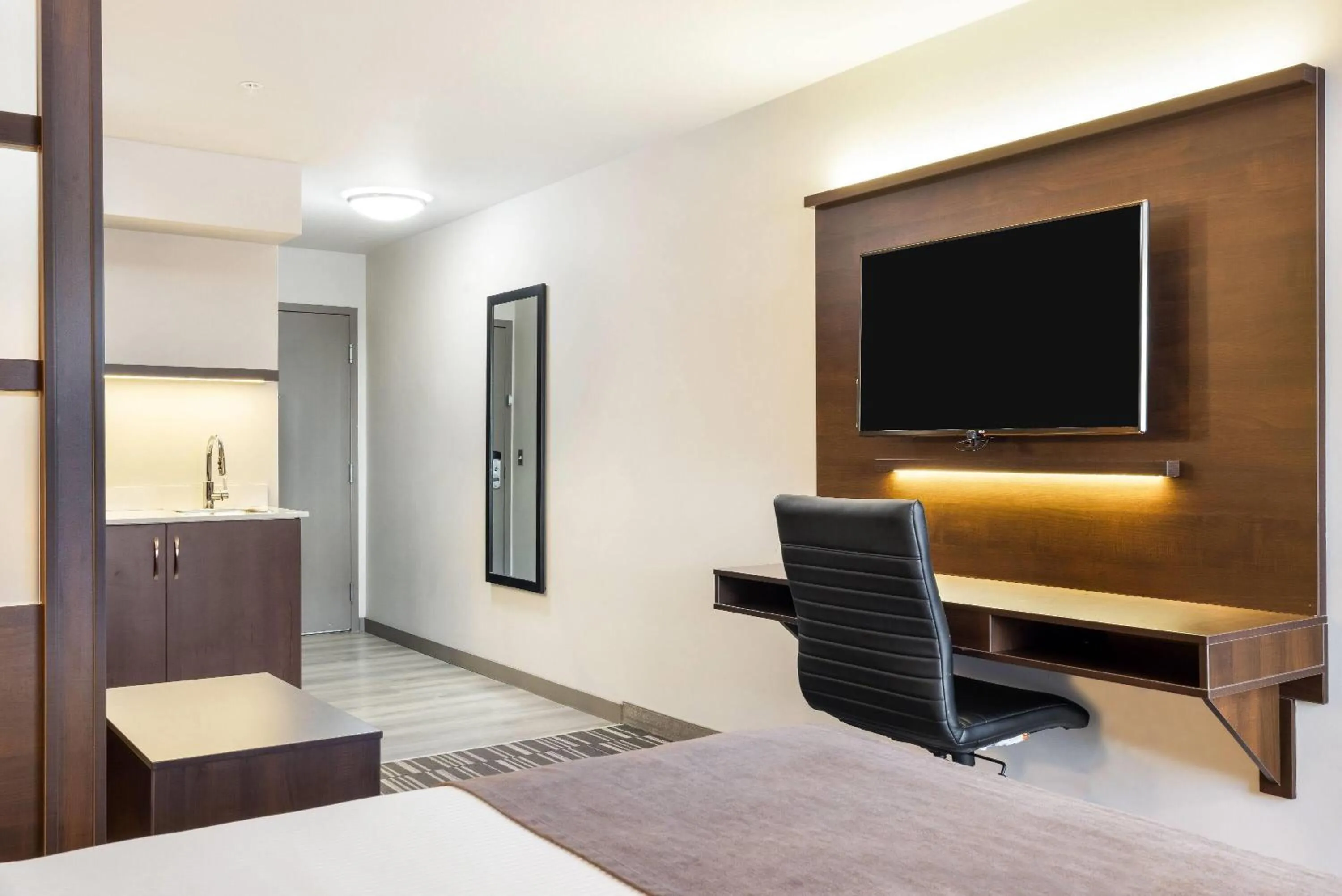 Bed in Microtel Inn & Suites by Wyndham Mont Tremblant