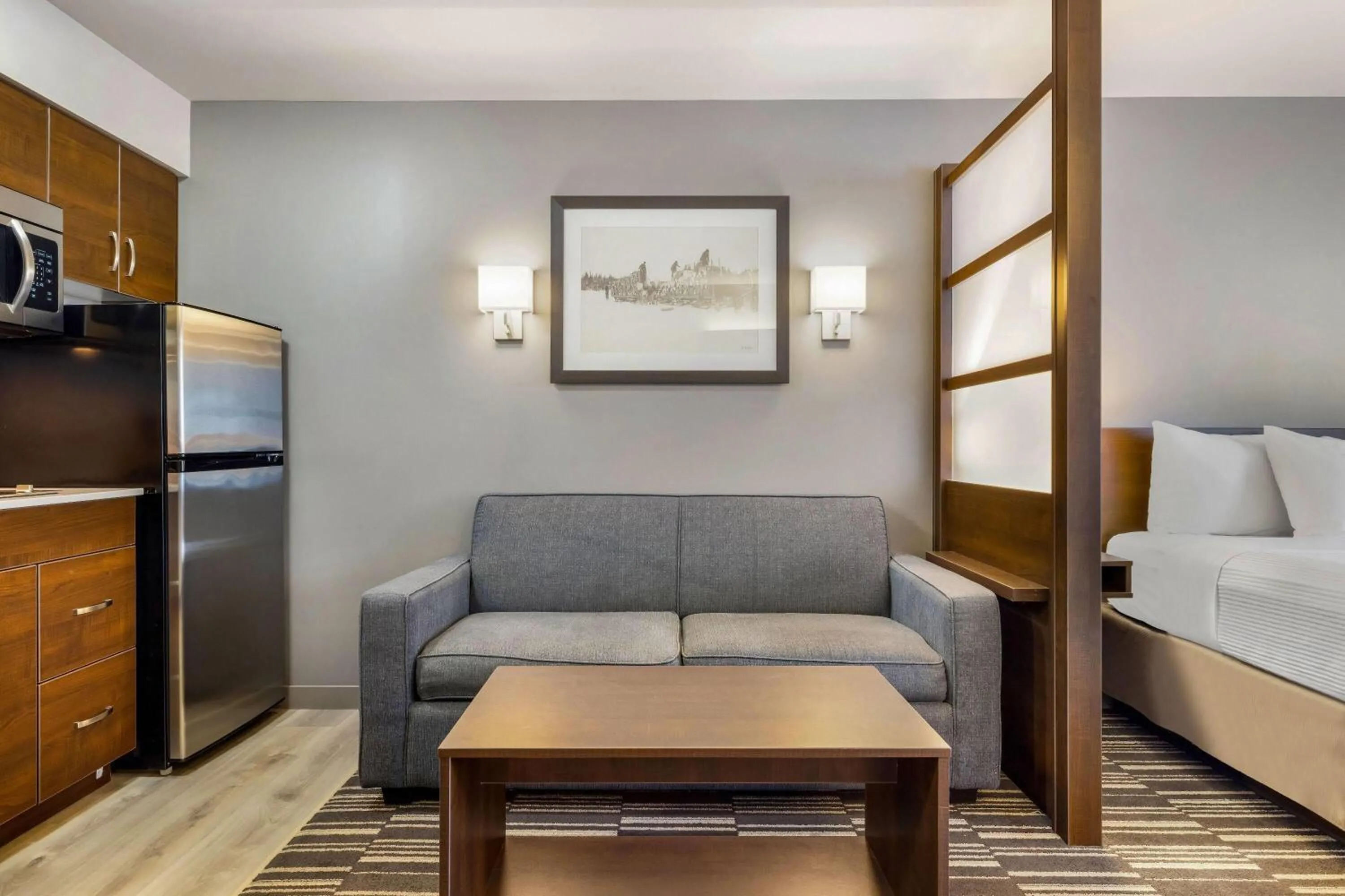 Photo of the whole room, Bed in Microtel Inn & Suites by Wyndham Mont Tremblant