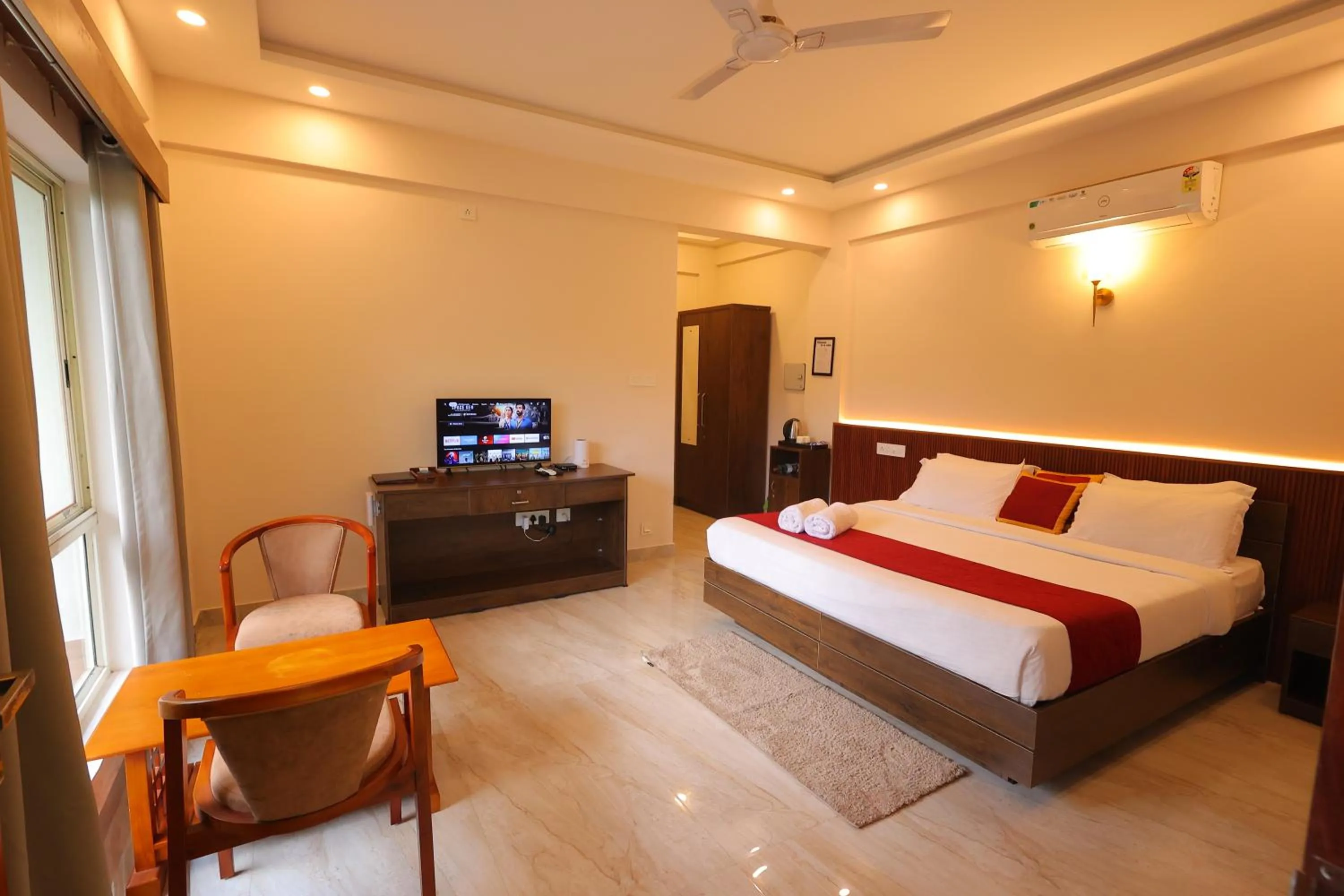 Bed in Le Eden Premium Wayanad Pool Resort
