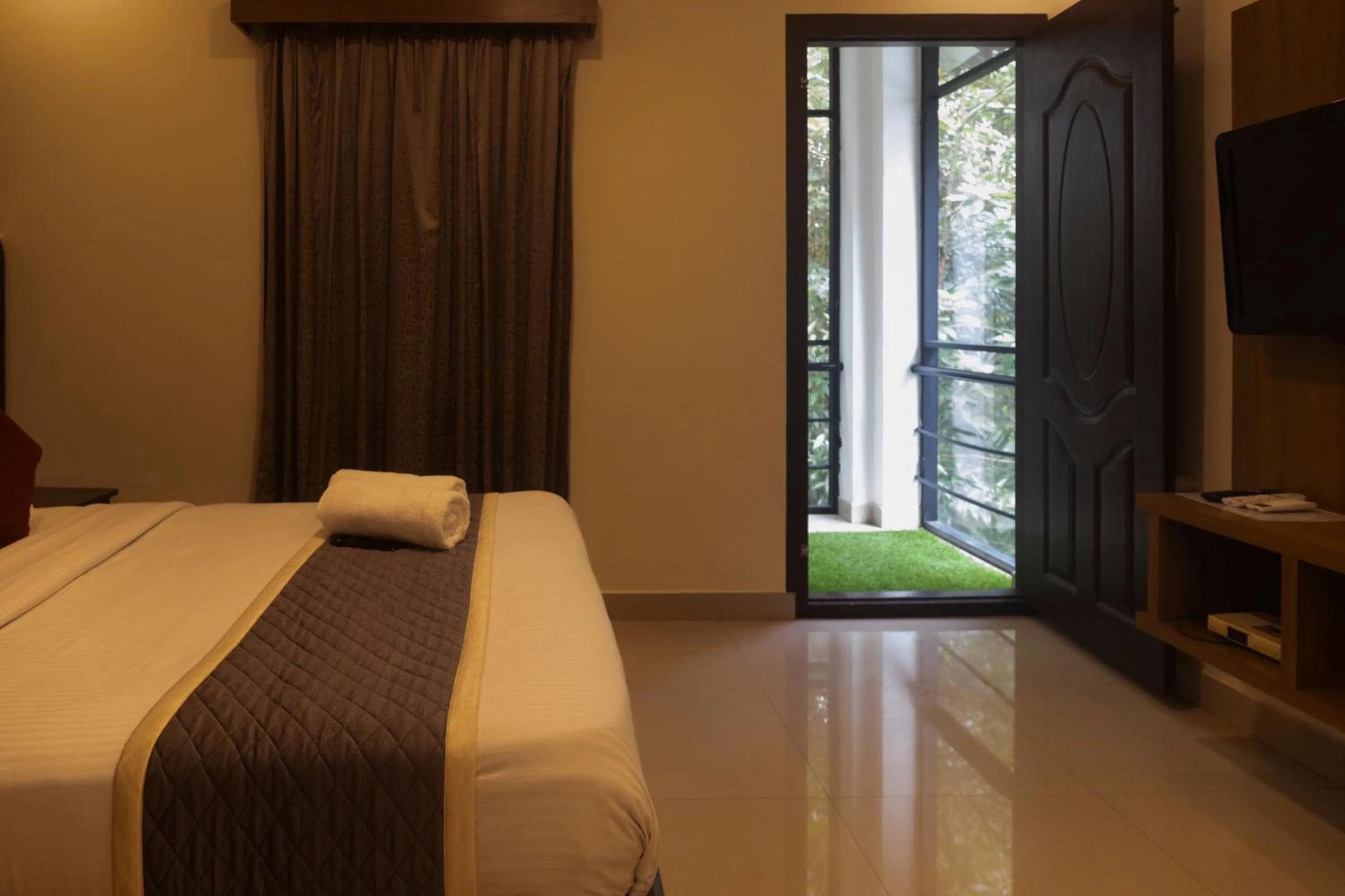 Photo of the whole room, Bed in Le Eden Premium Wayanad Pool Resort