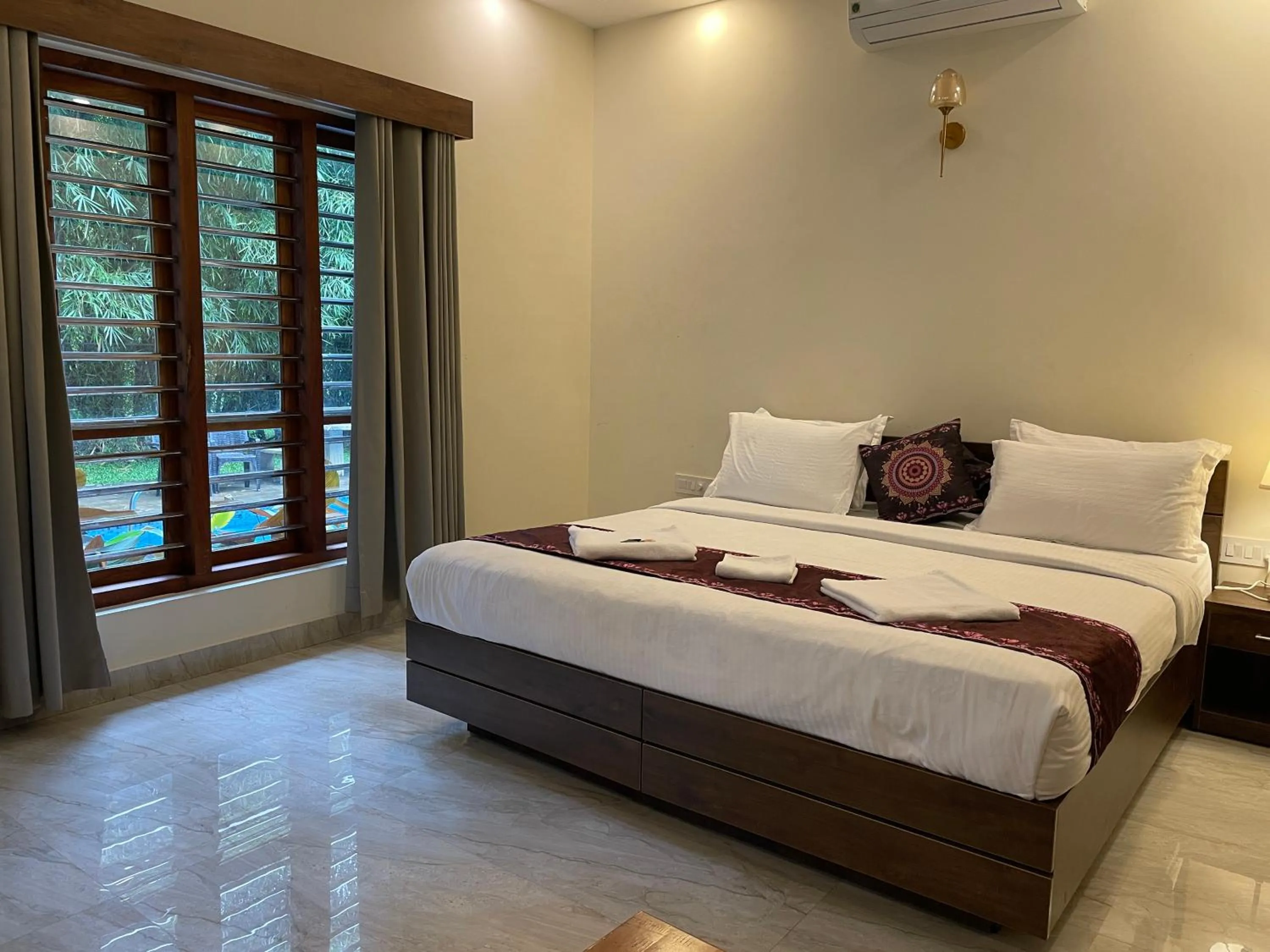 Bed in Le Eden Premium Wayanad Pool Resort