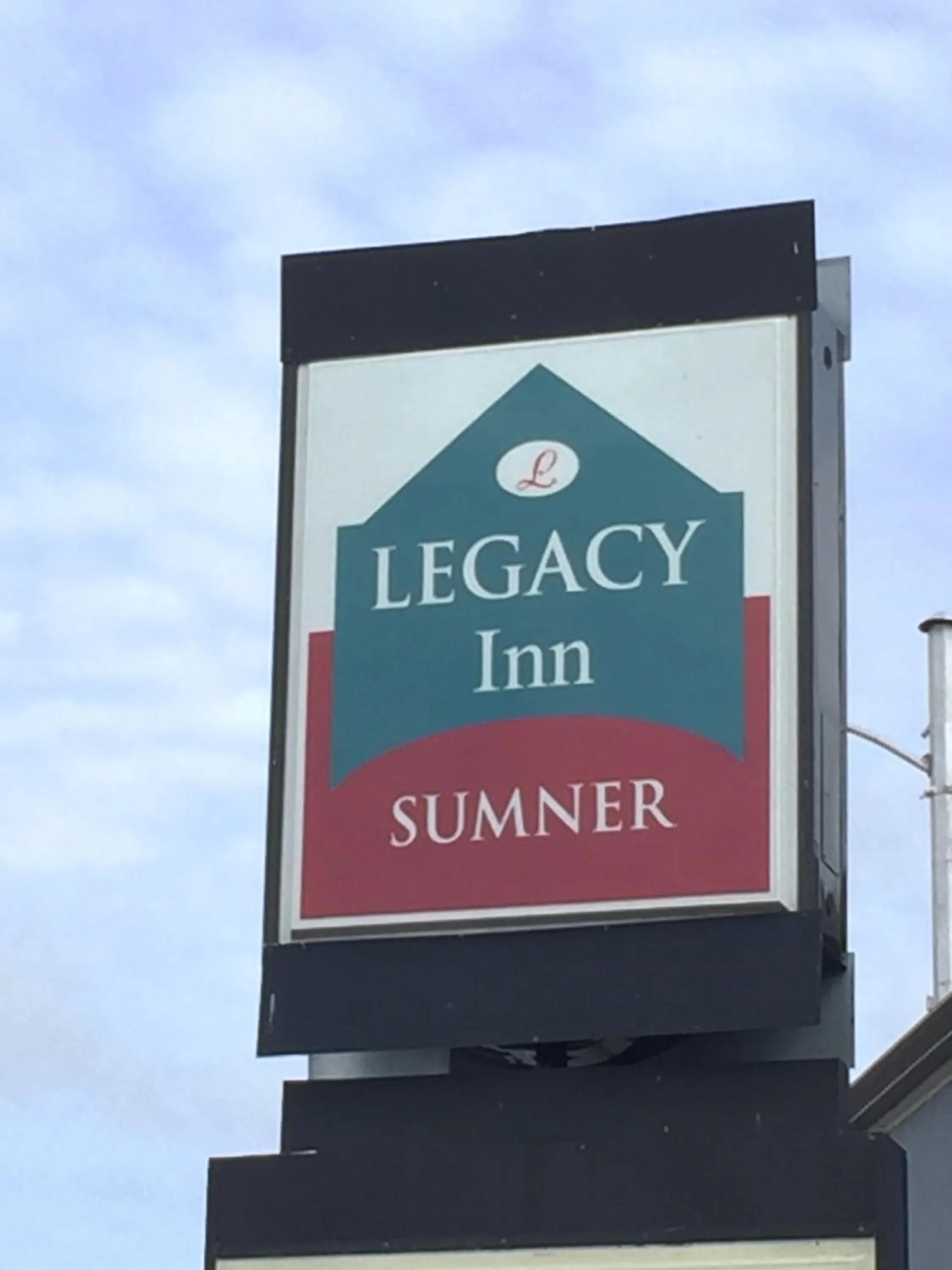 Property logo or sign in Legacy Inn - Gallatin