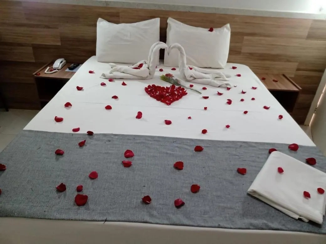 Bed in Tropical Mar Hotel