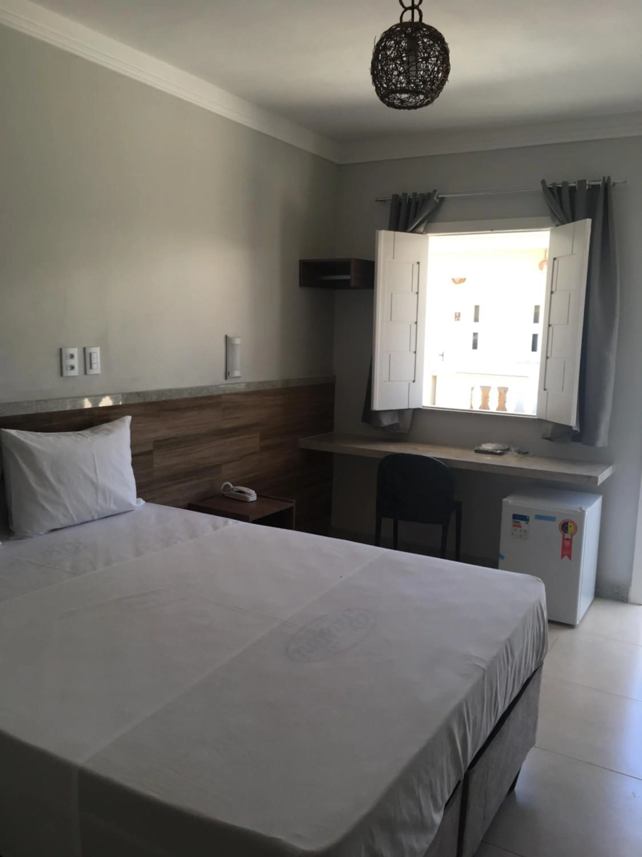 Bed in Tropical Mar Hotel