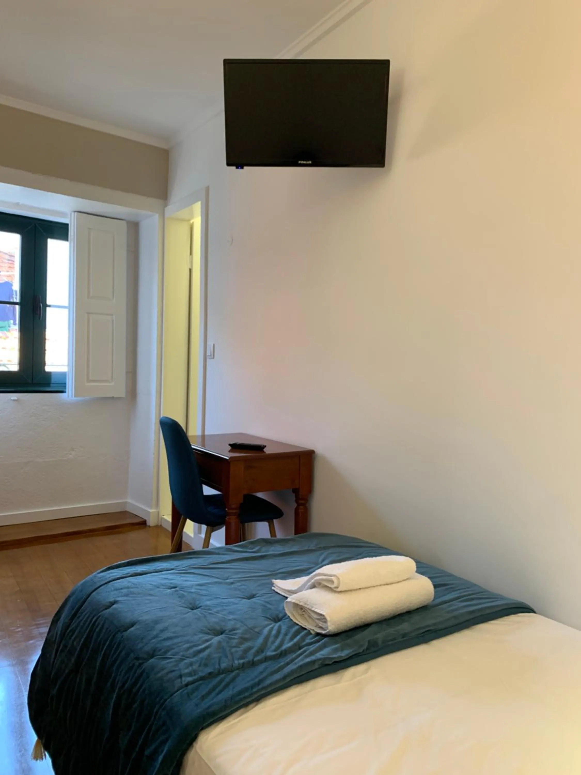 Bed in A Portuguesa Guest House