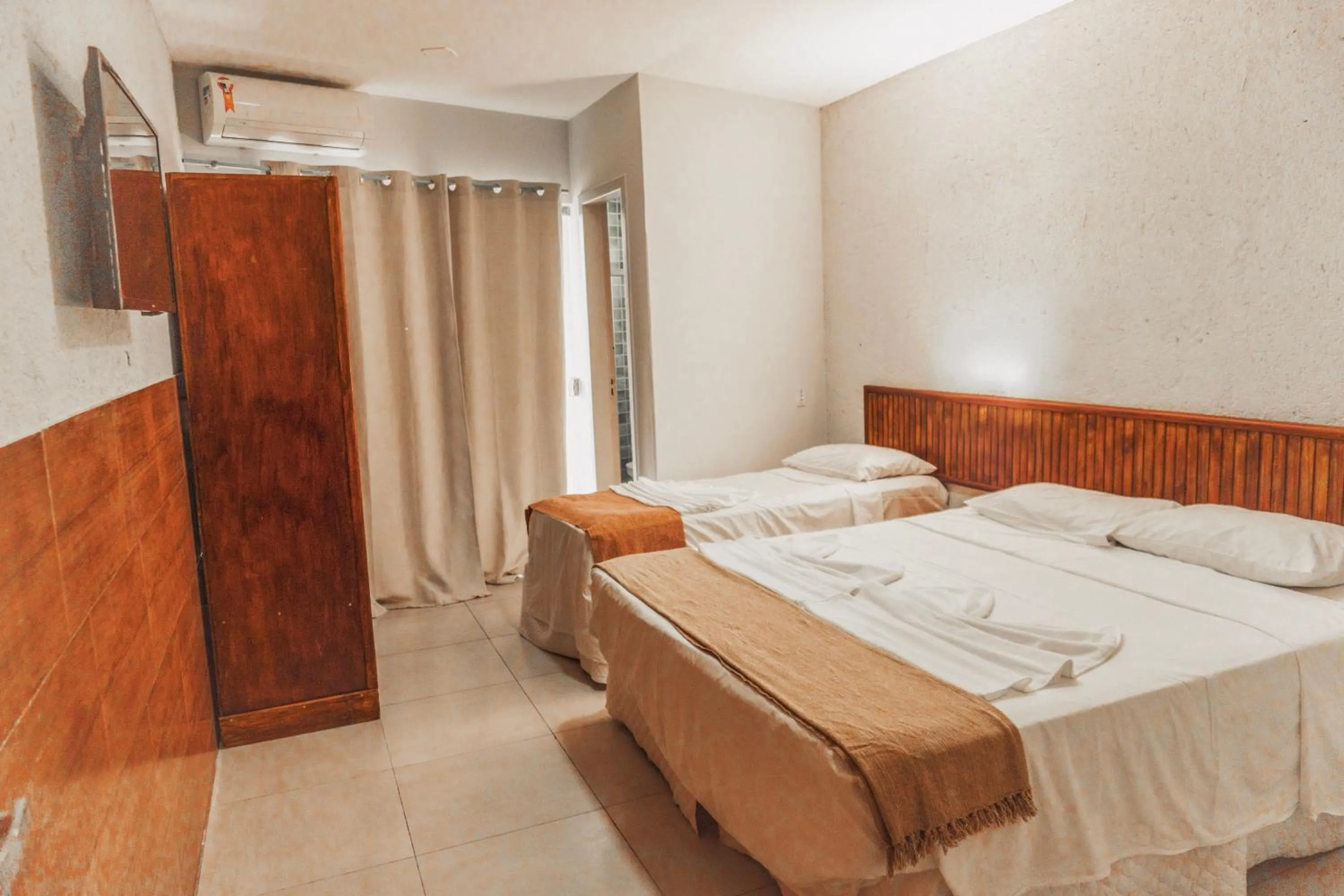 Bed in Garça Branca Praia Hotel