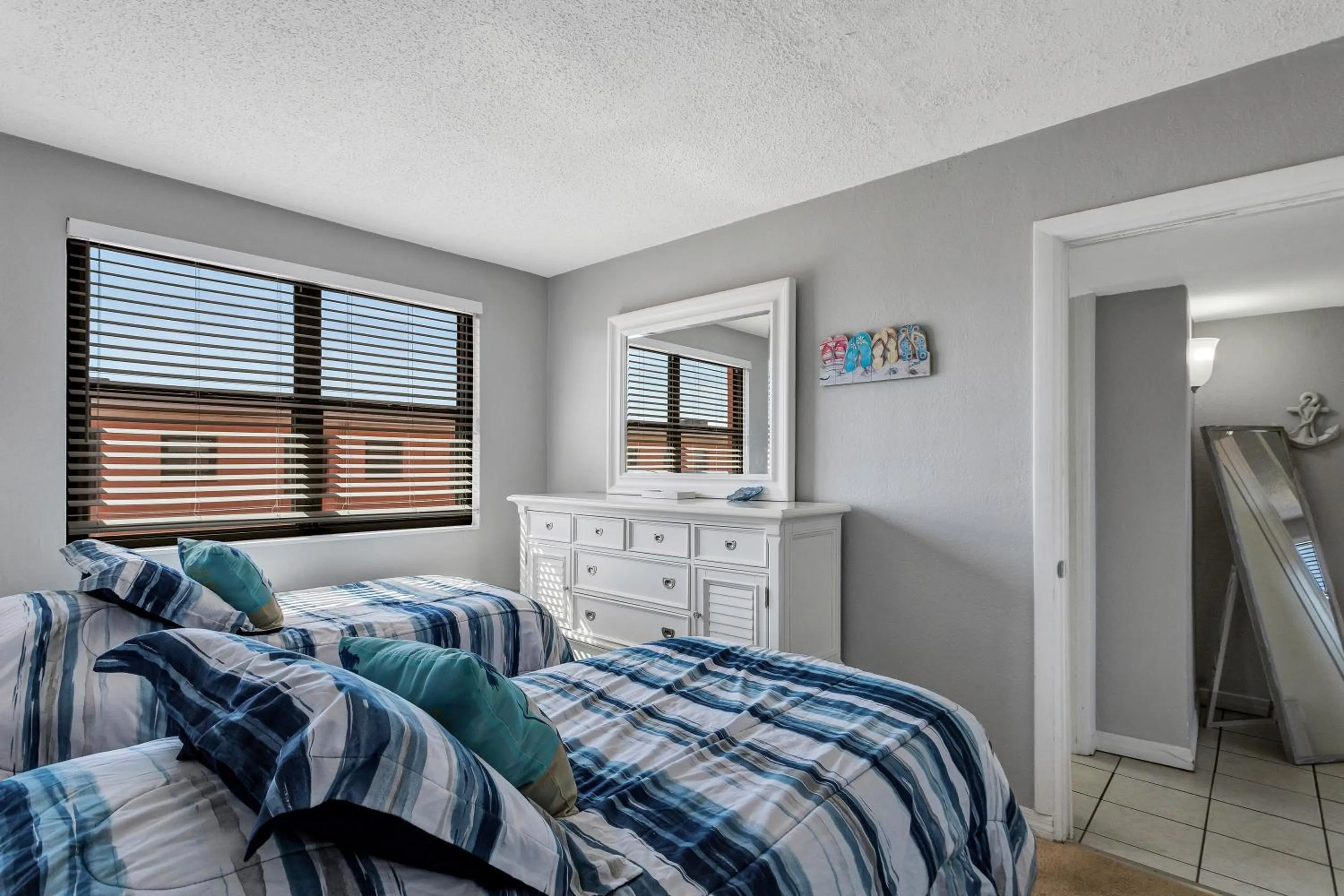 Bedroom in Gulf Winds Resort by Travel Resort Services