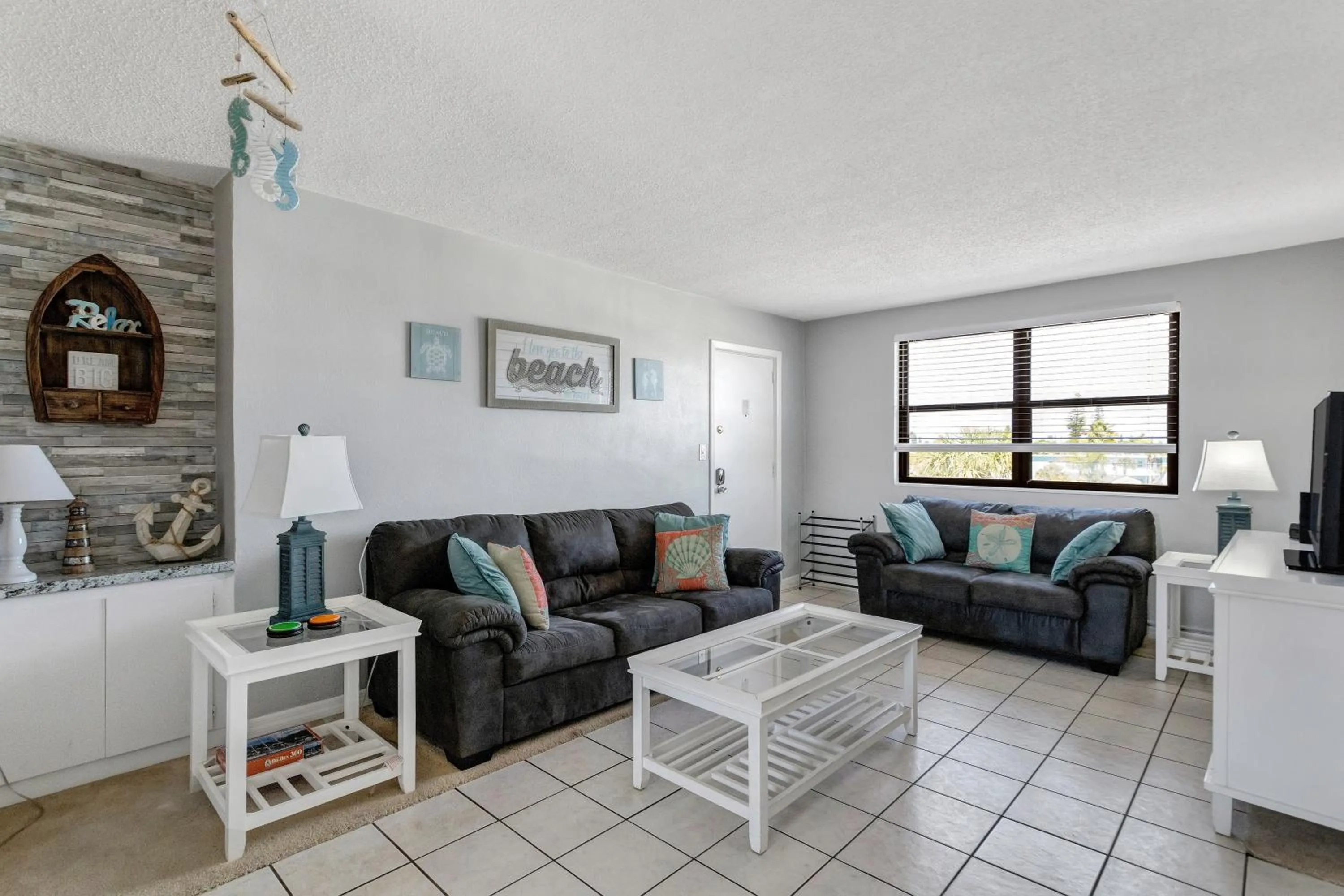 Living room in Gulf Winds Resort by Travel Resort Services