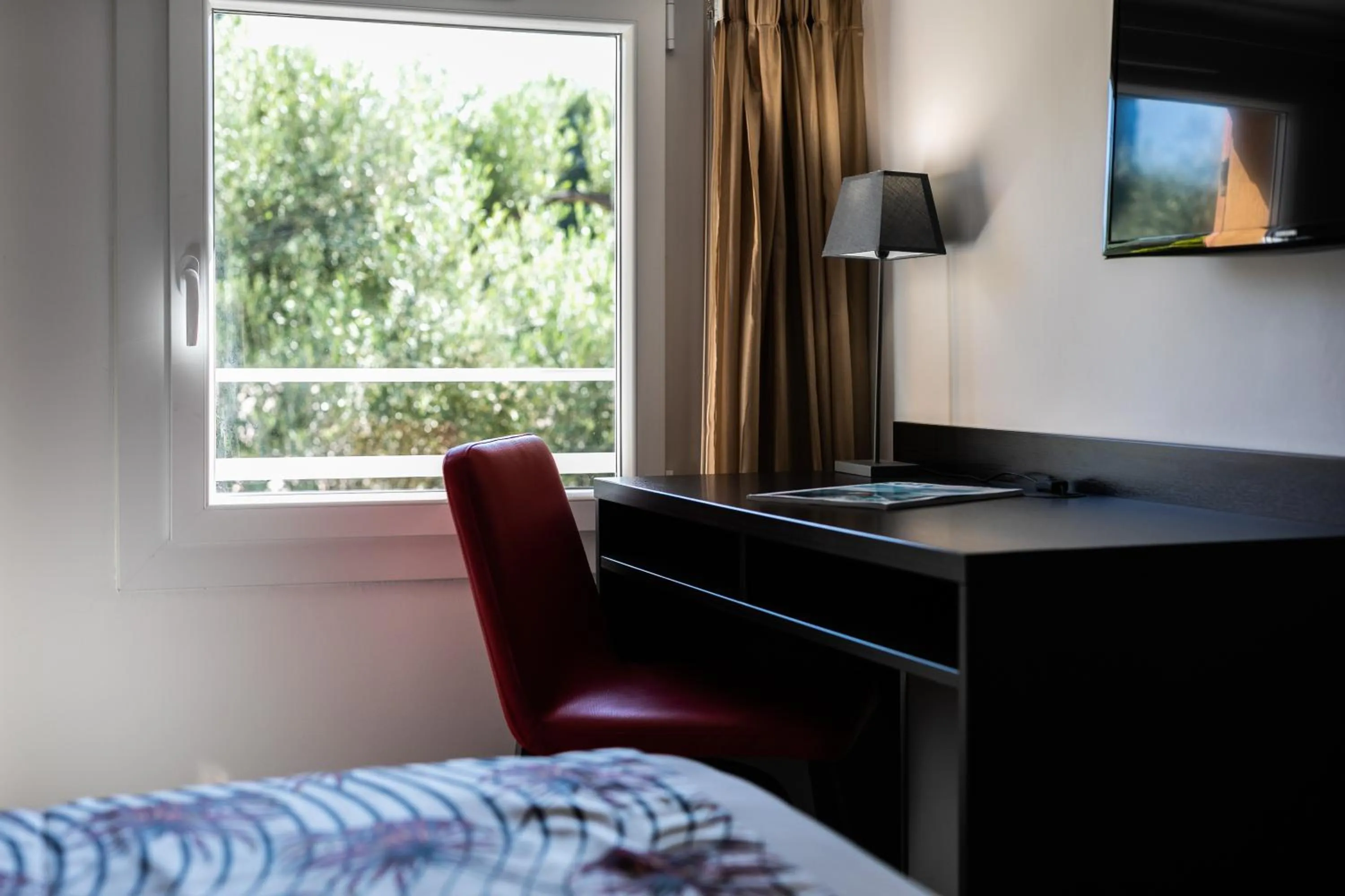 Bed in Hôtel Corniche du Liouquet