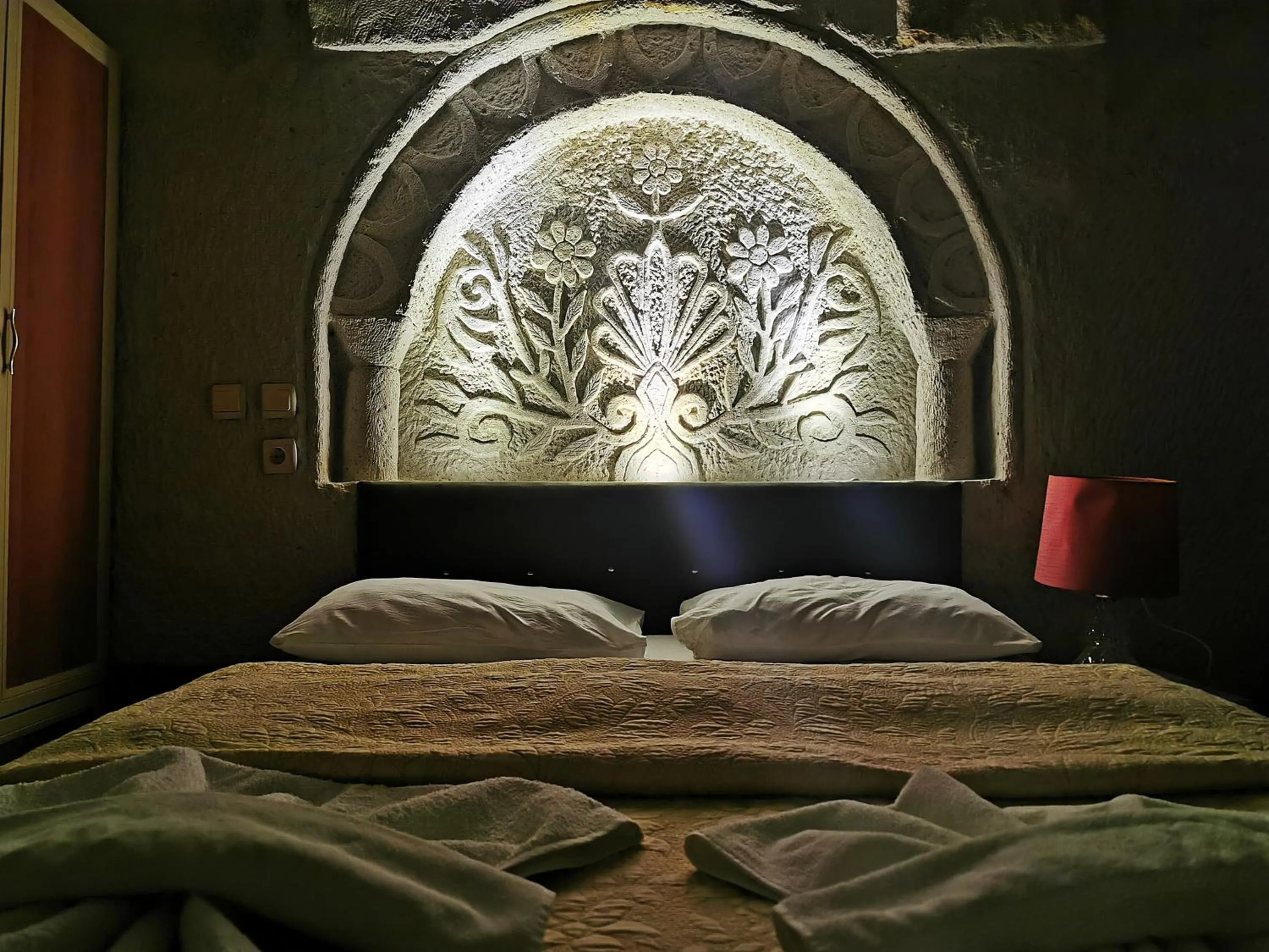 Bed in Falcon Cave Suites
