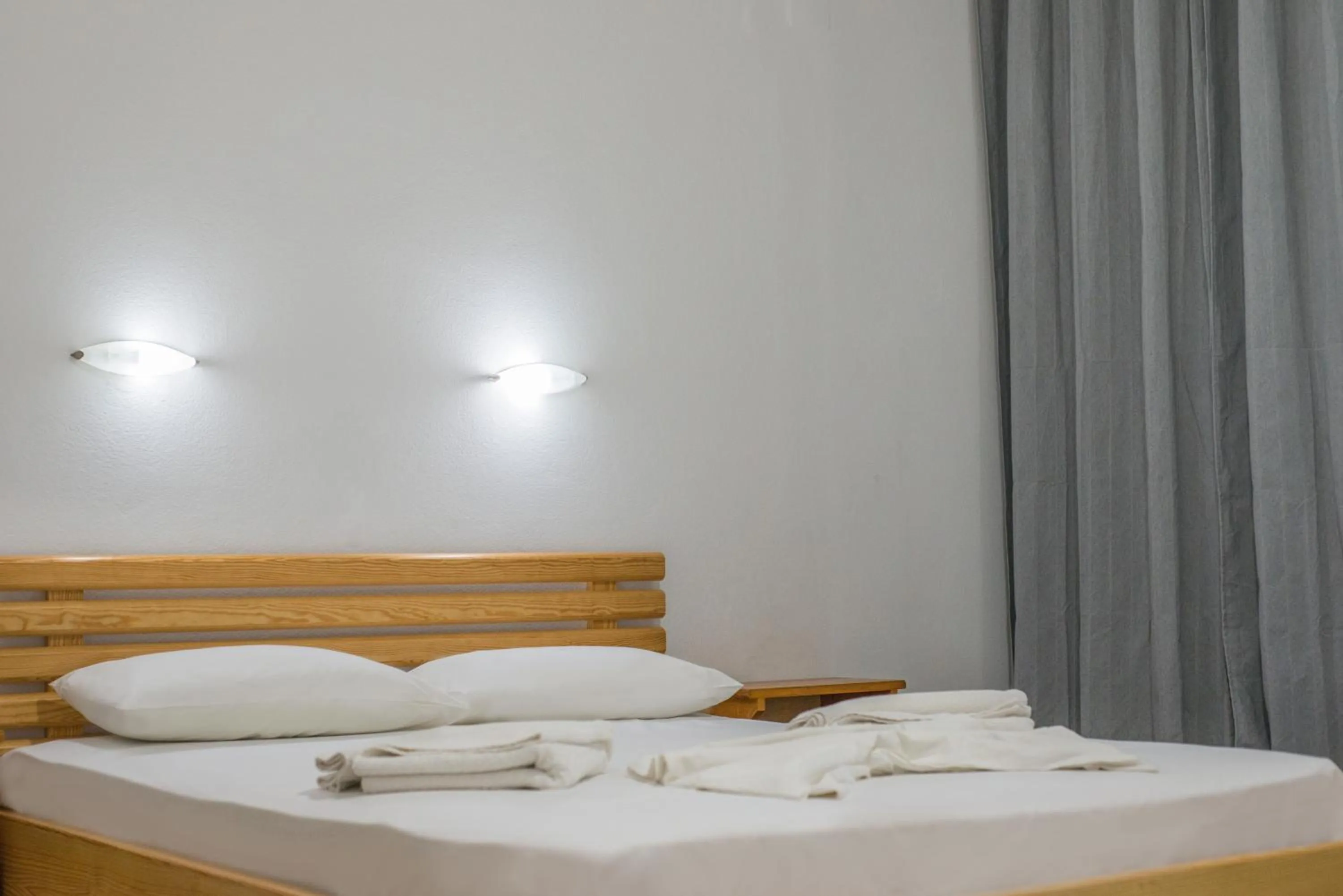 Bed in Stefania Studios by Estia