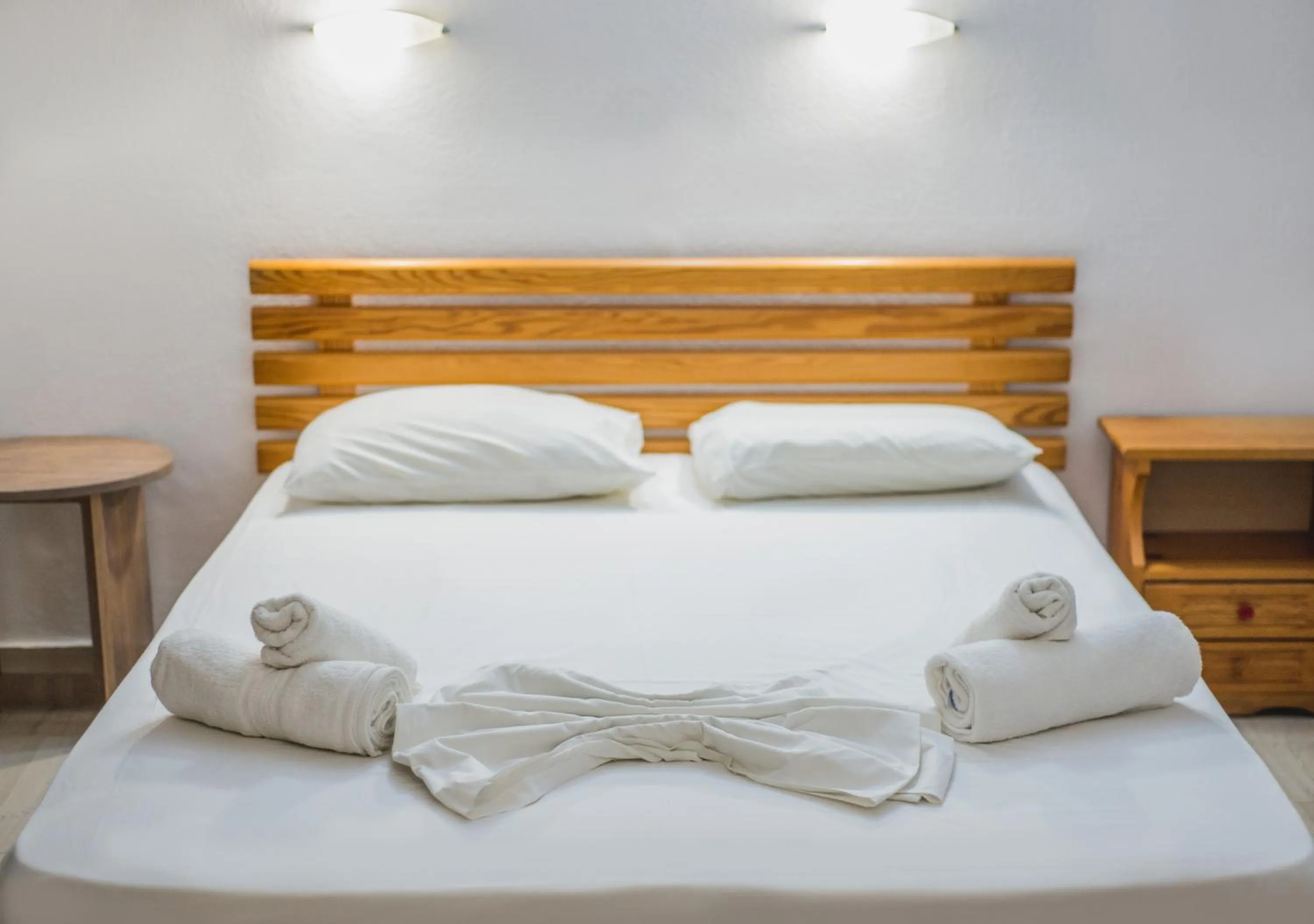 Bed in Stefania Studios by Estia