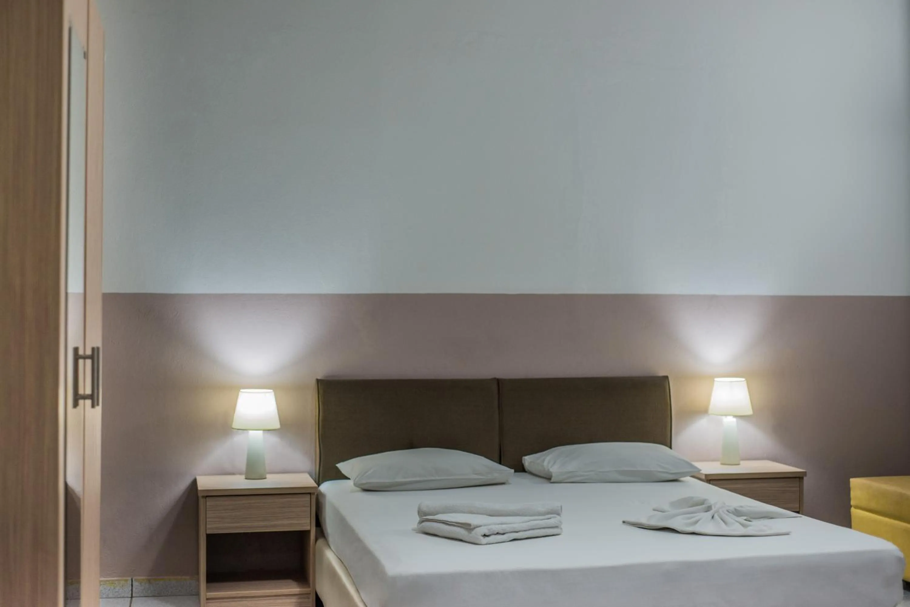 Bed in Stefania Studios by Estia