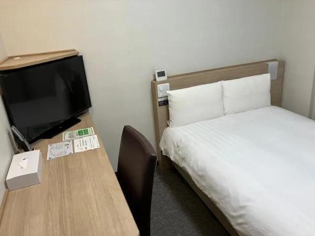 Bed in Dormy Inn Express Matsue