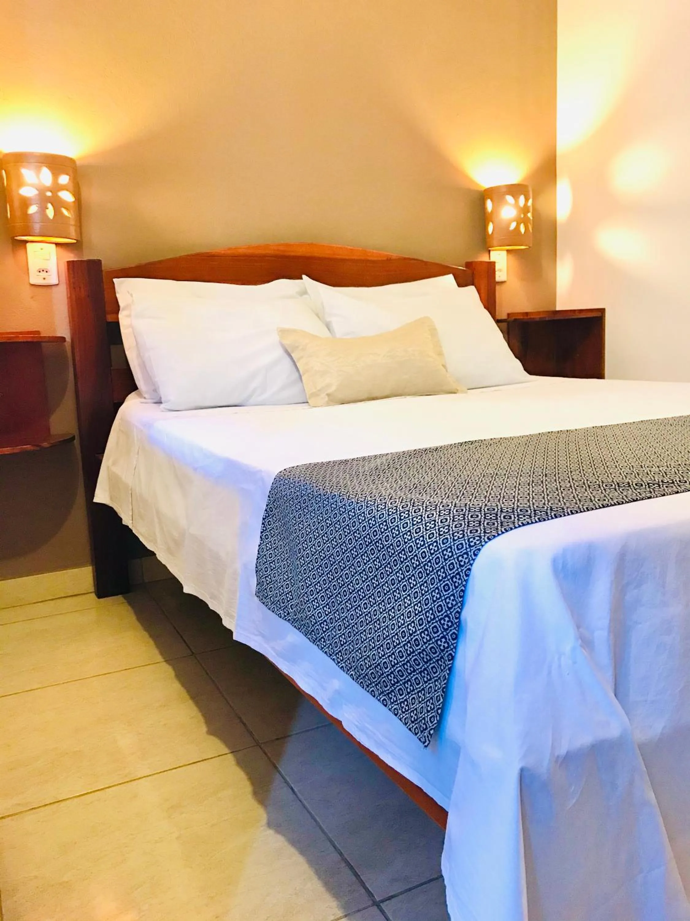 Bed in Pousada Ilha do Encanto