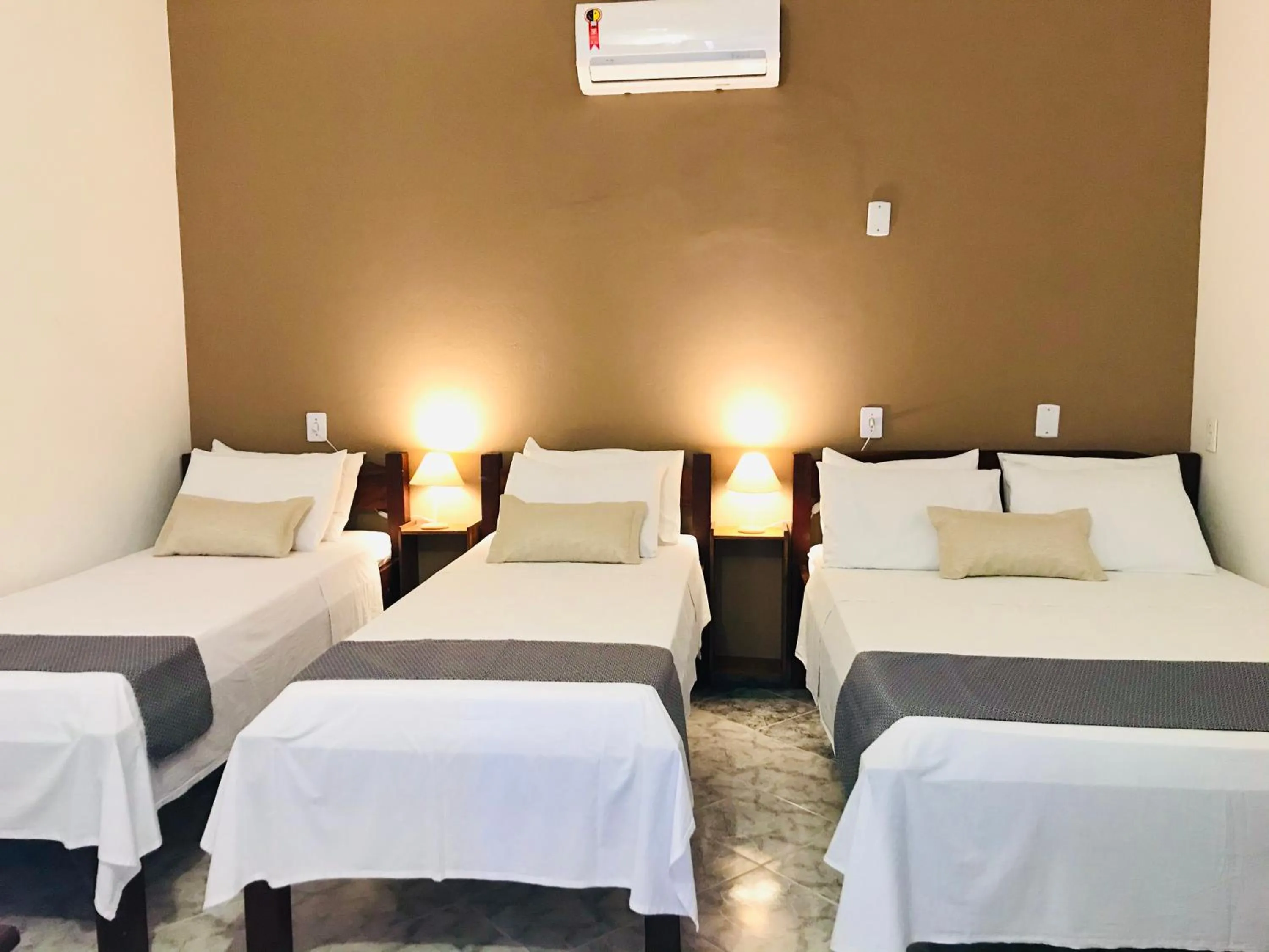 Photo of the whole room in Pousada Ilha do Encanto