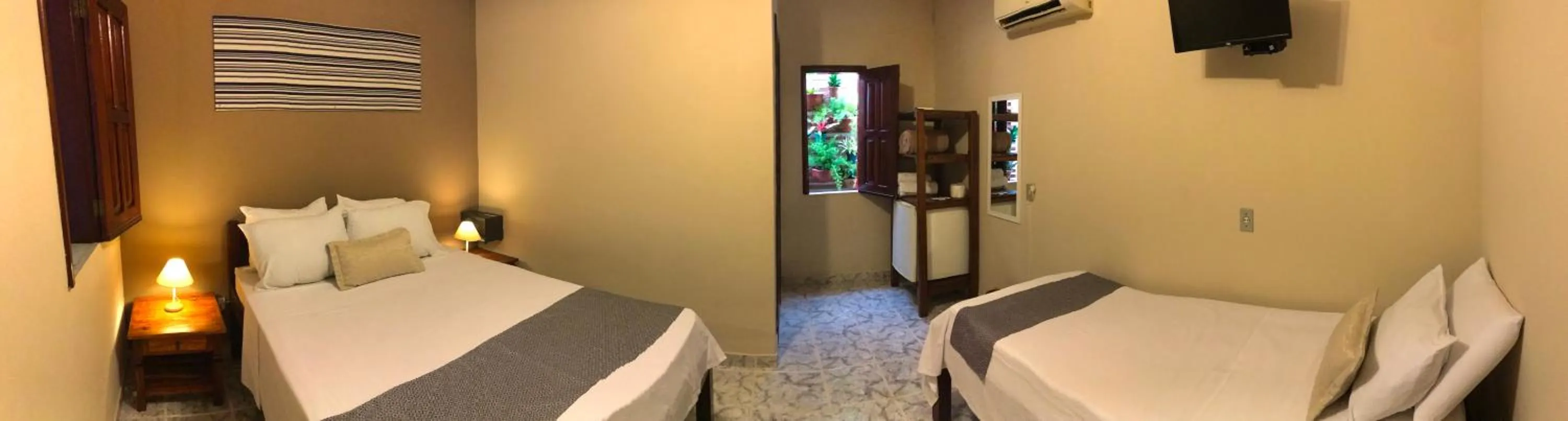 Bed in Pousada Ilha do Encanto