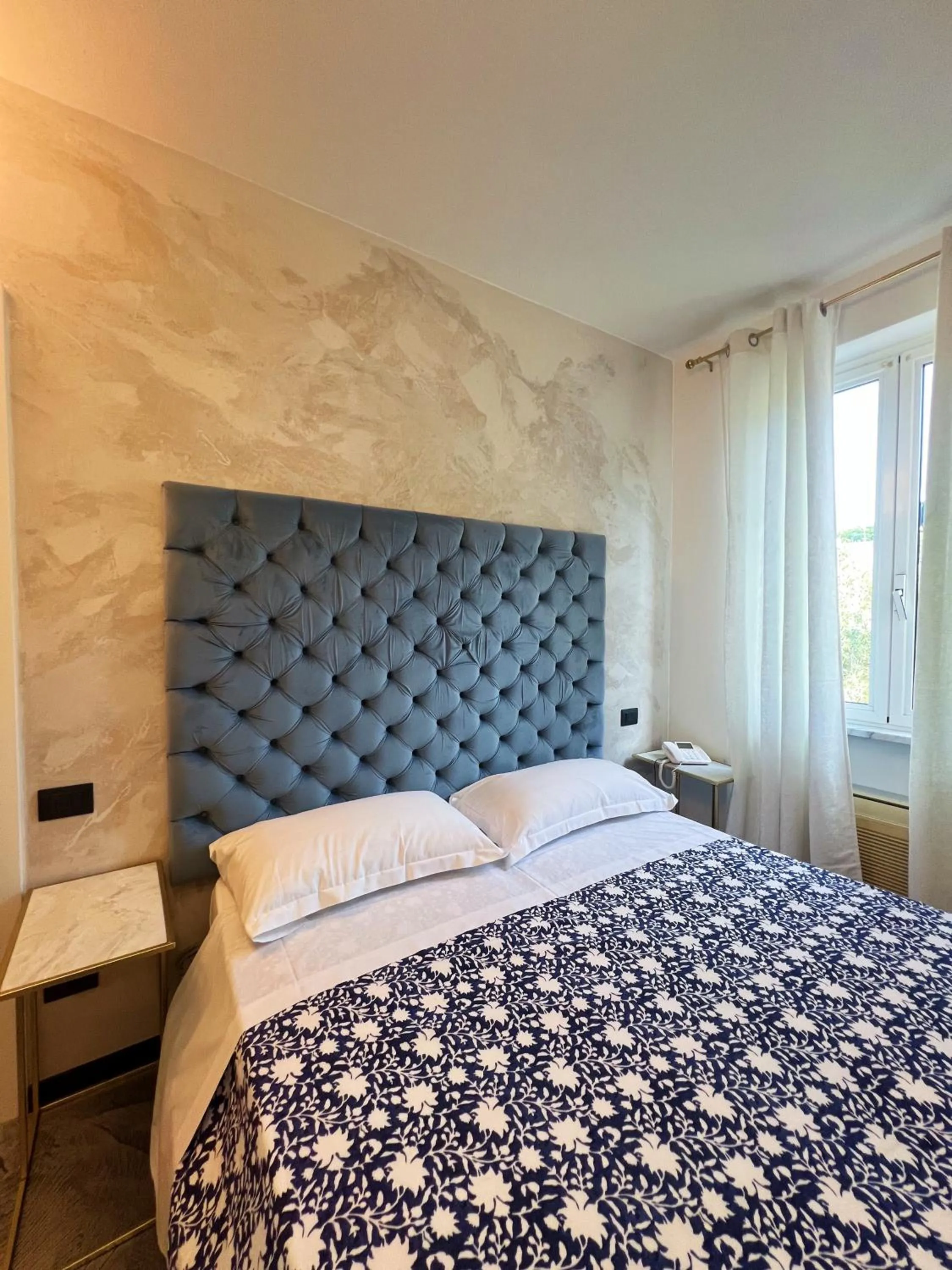 Bed in Hotel Le Grazie