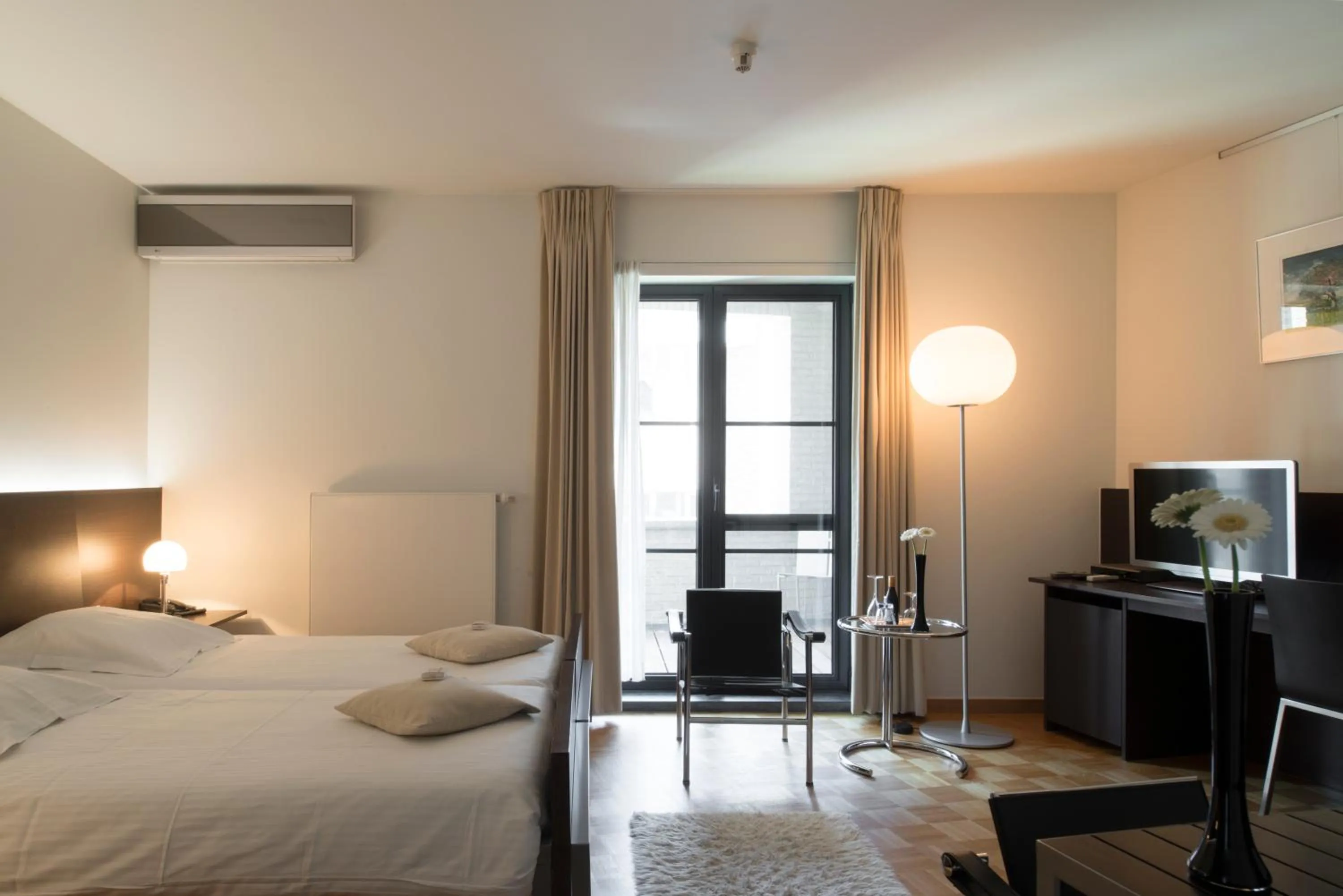 Bed in Hotel Verlooy