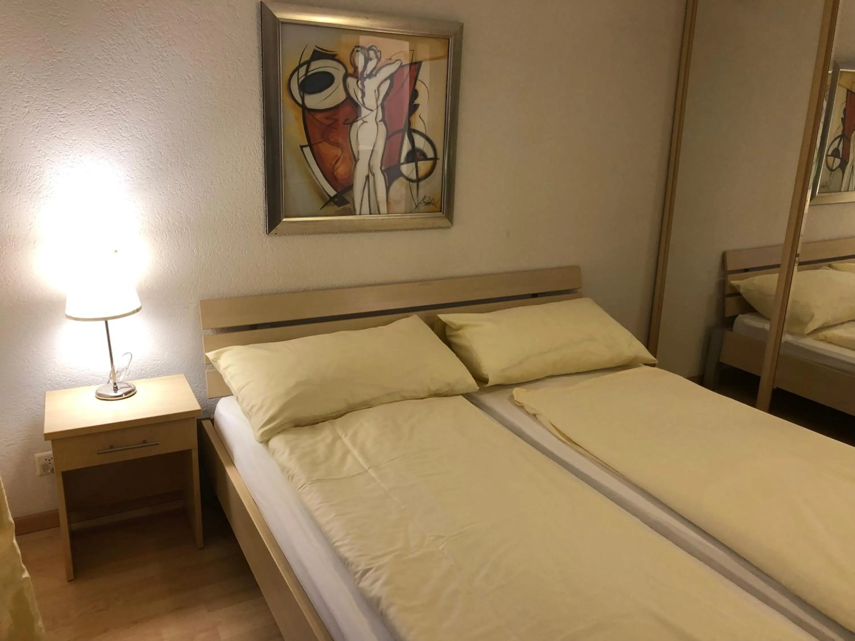 Bed in SASS APARTHOTEL