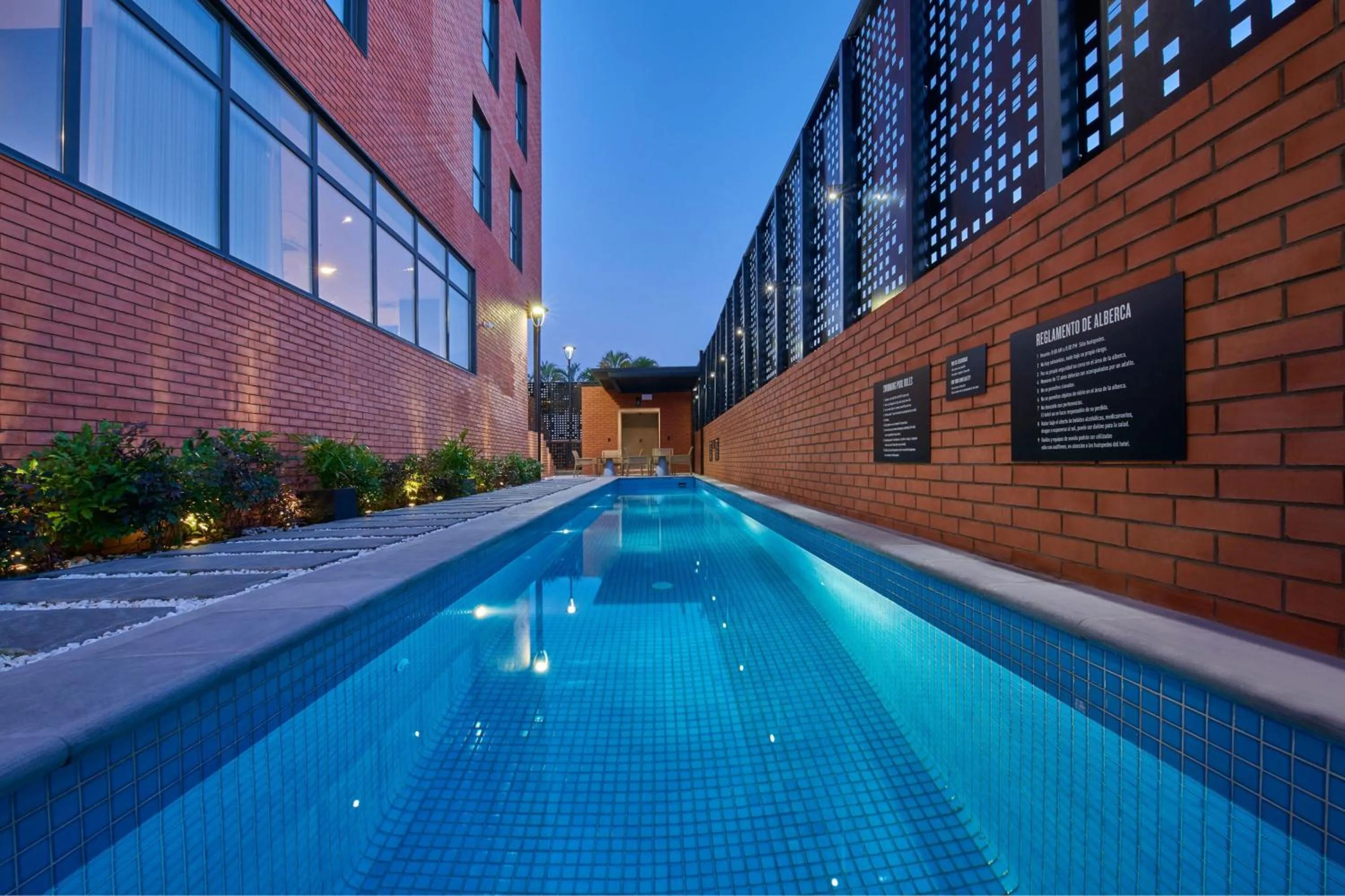 Swimming pool in City Express Plus by Marriott Tampico