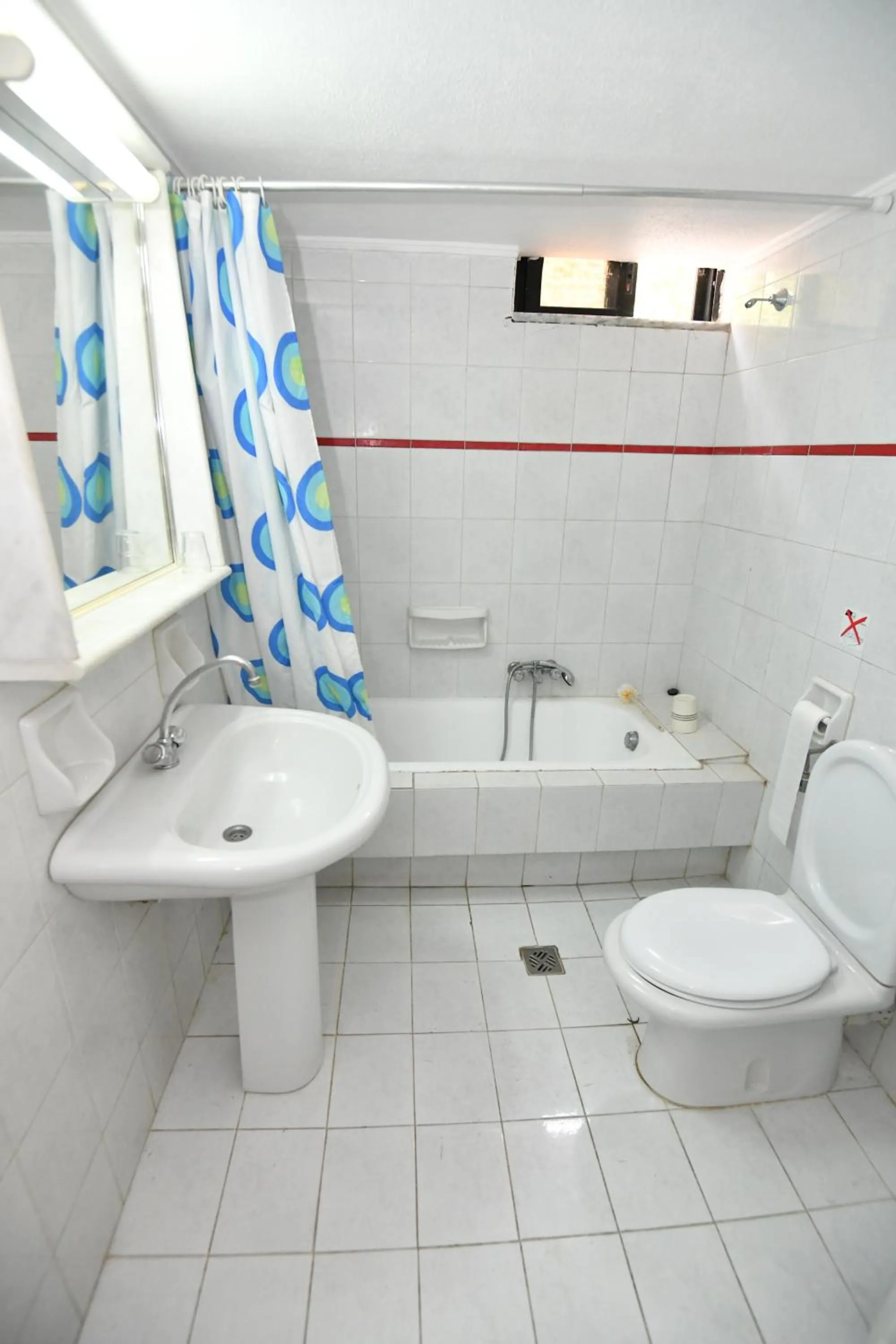 Toilet in Niki Hotel Apartments