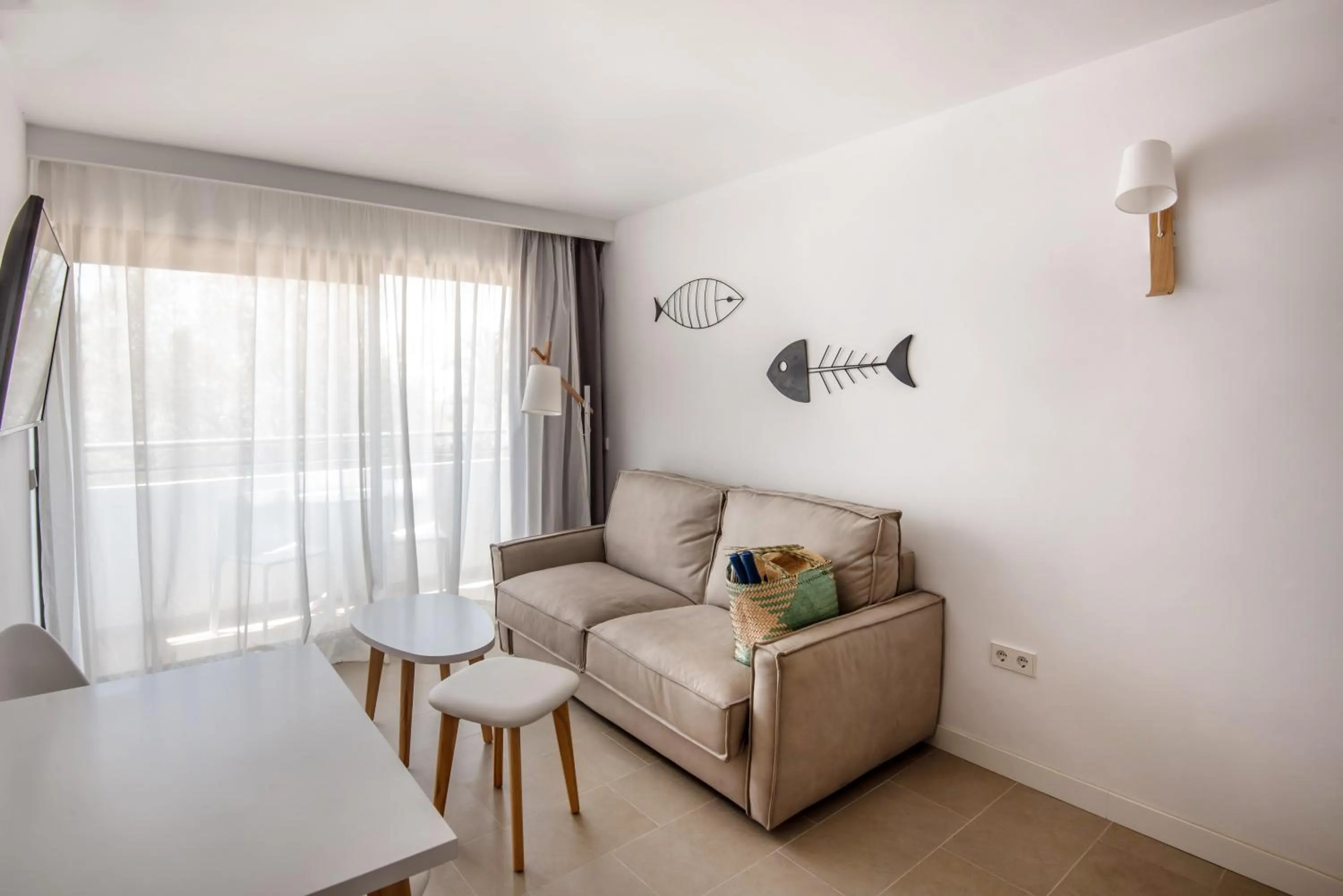 Living room in Apartamentos Es Pujols - Emar Hotels