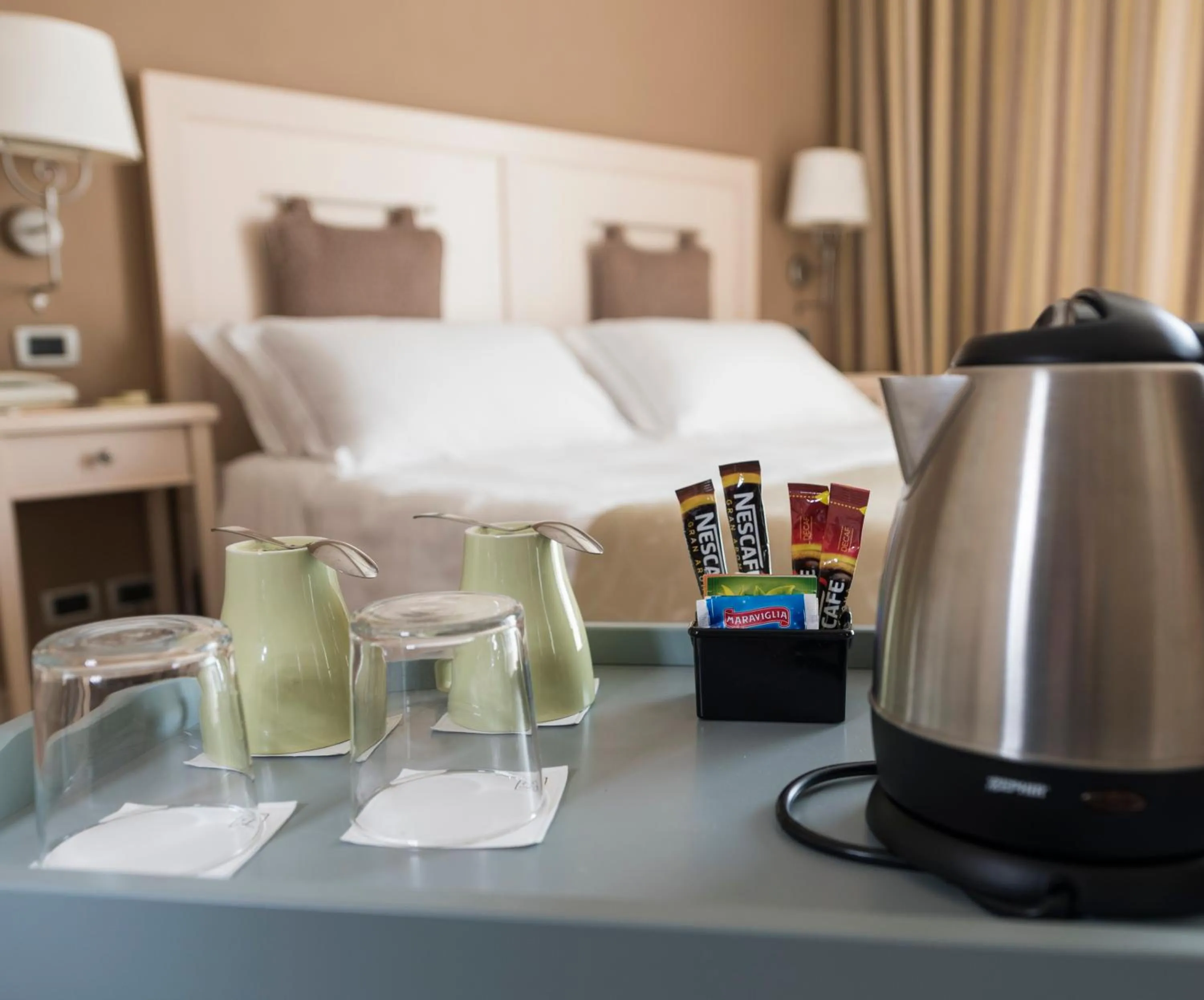 Coffee/tea facilities, Bed in Hotel Liliana Diano Marina