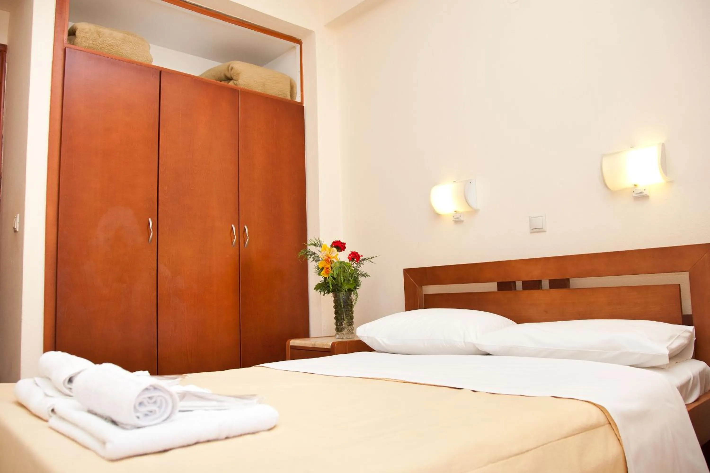 Photo of the whole room, Bed in Akroyali Hotel & Villas