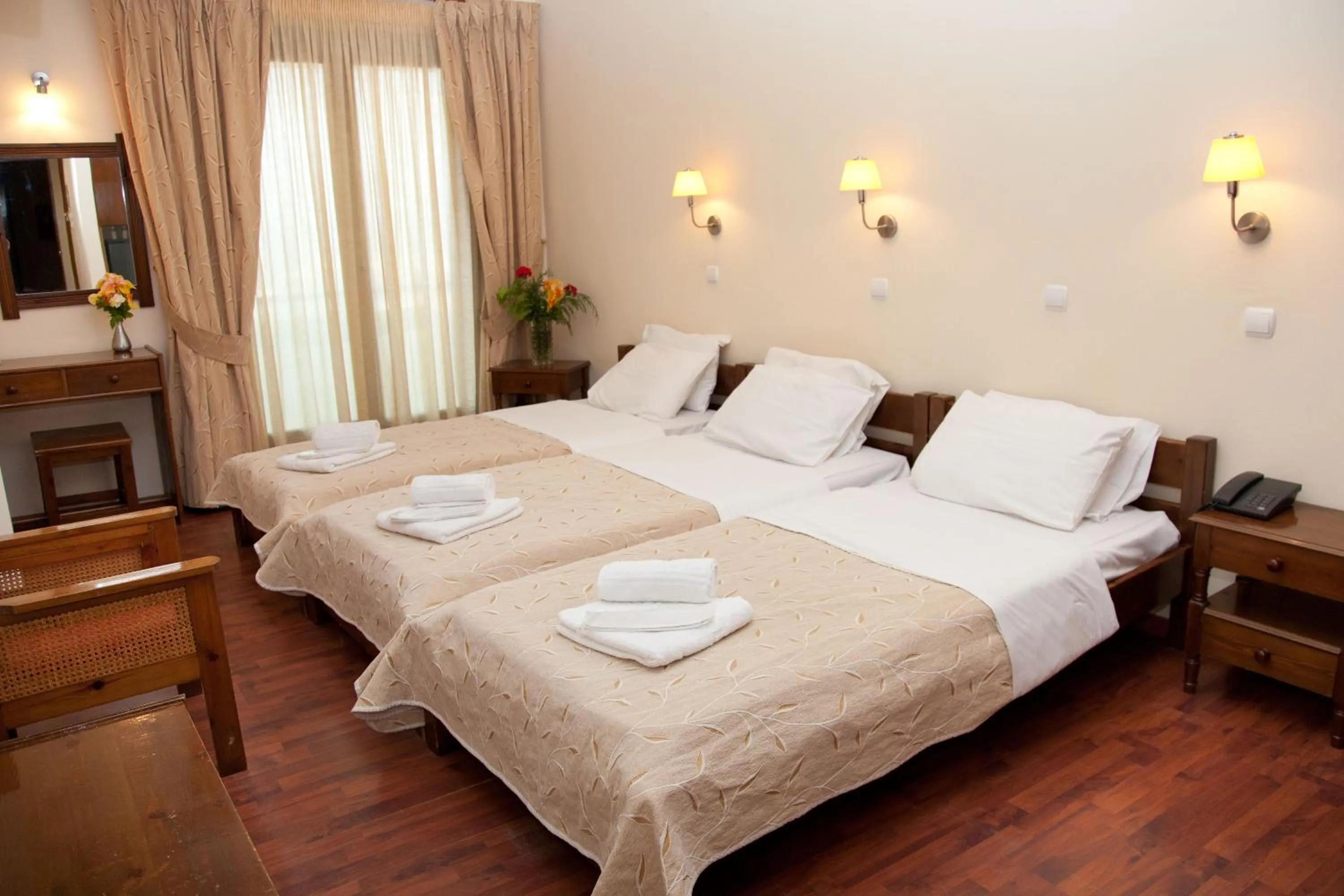 Photo of the whole room, Bed in Akroyali Hotel & Villas
