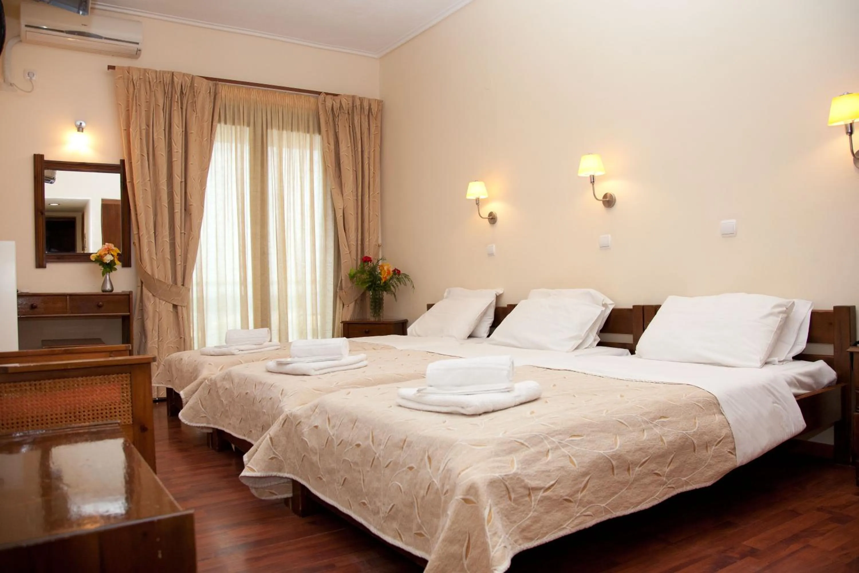 Photo of the whole room, Bed in Akroyali Hotel & Villas