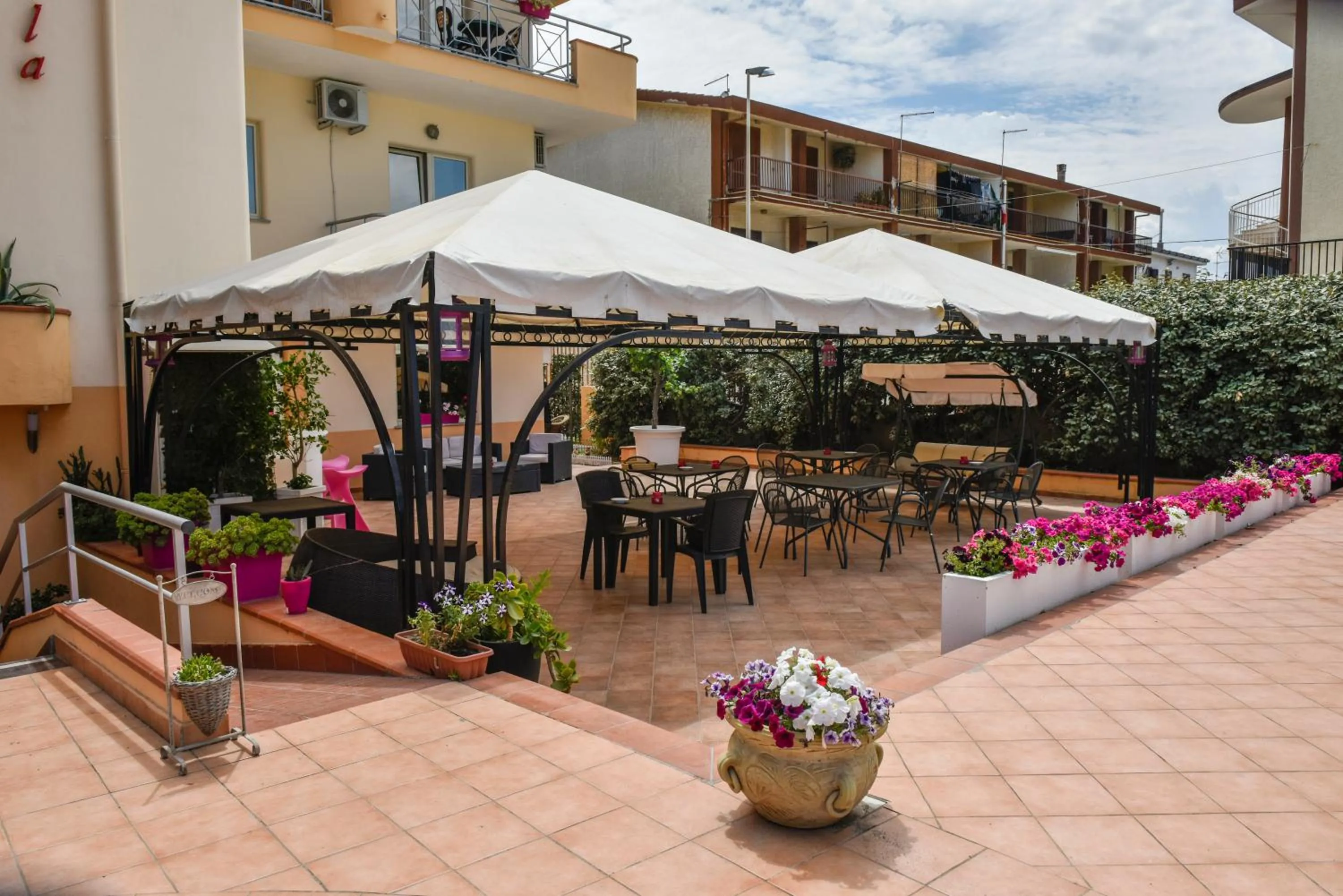 Property building in Hotel La Villa