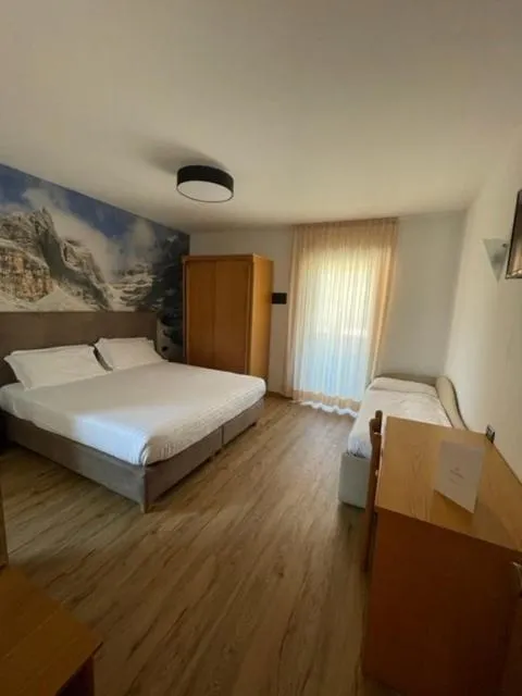Bed in Hotel Rosa Alpina